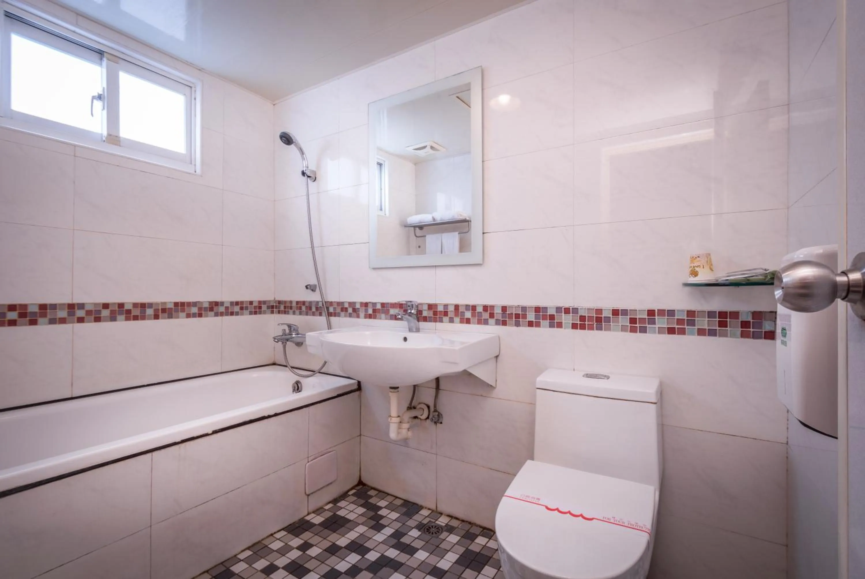 Bathroom in Golden Phoenix Hotel