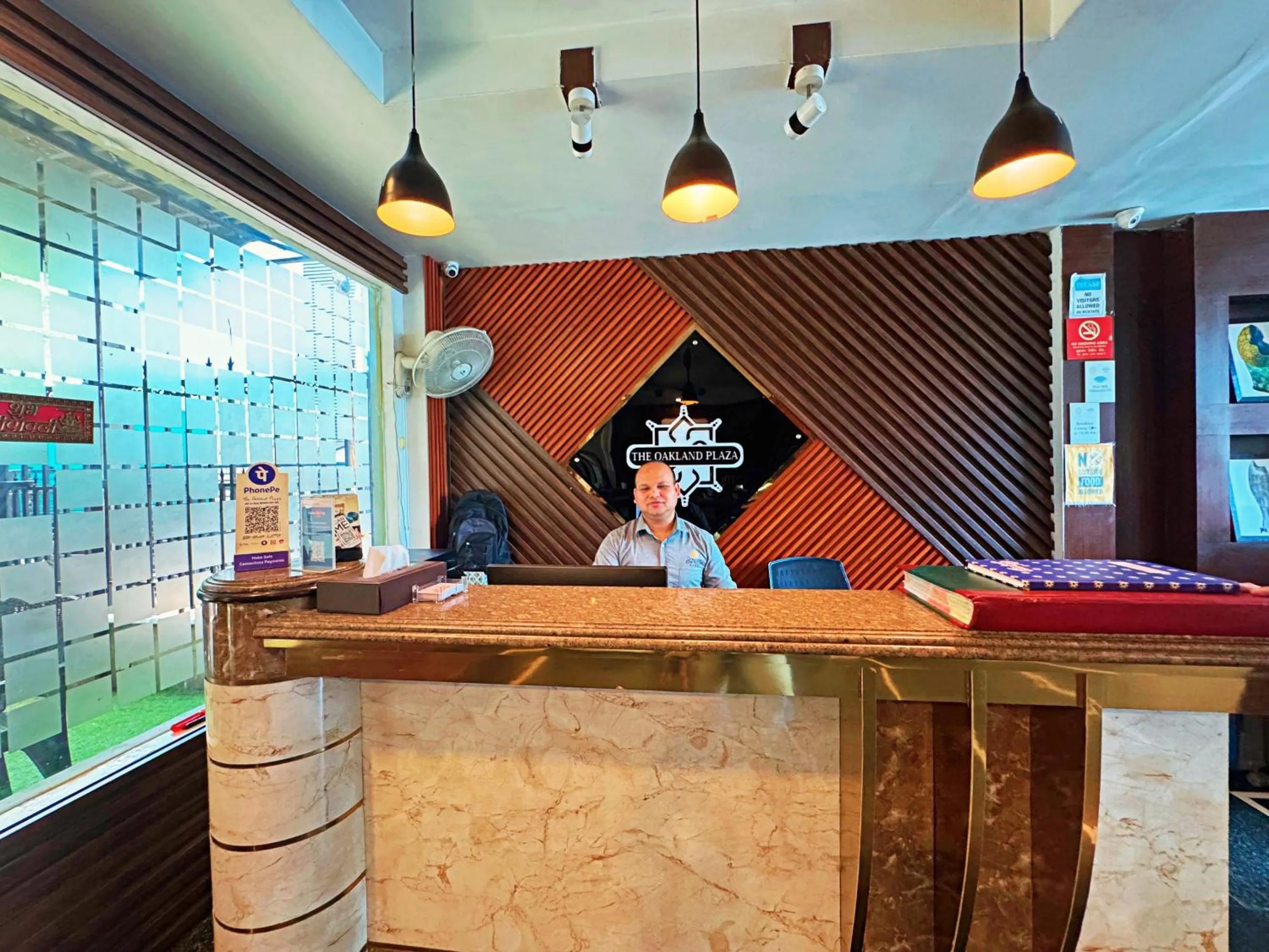 Lobby or reception in The Oakland Plaza by Orion Hotels