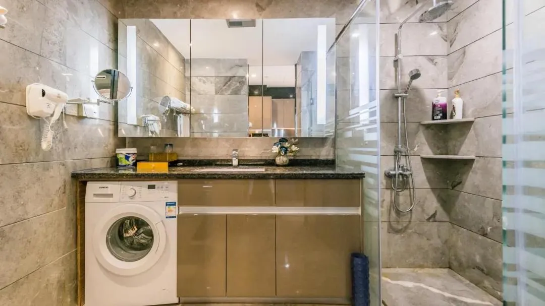 Bathroom in Green Lemon Tree International Apartment - Beijing Road Jiedeng Metropolis Branch