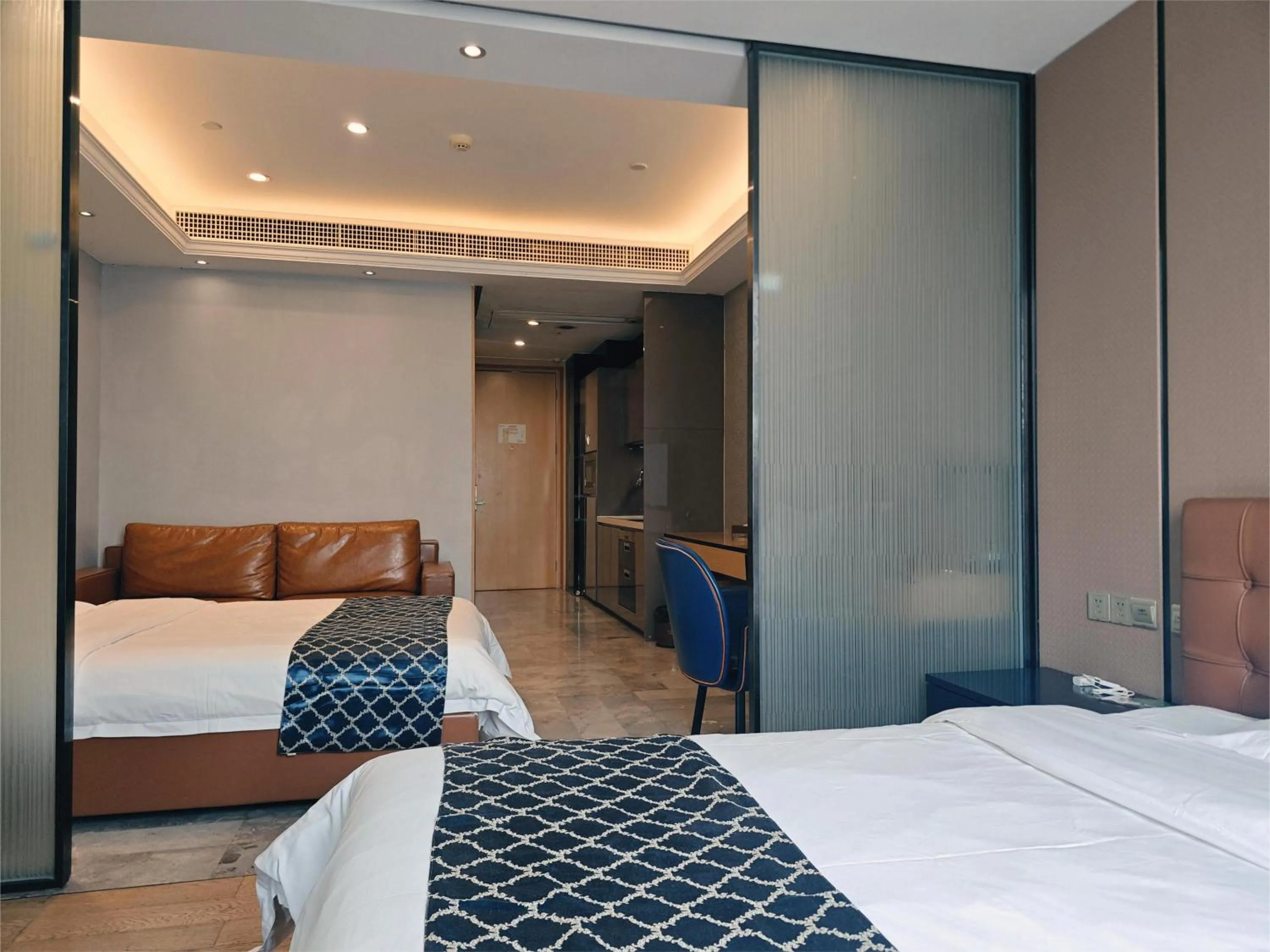 Photo of the whole room, Bed in Green Lemon Tree International Apartment - Beijing Road Jiedeng Metropolis Branch