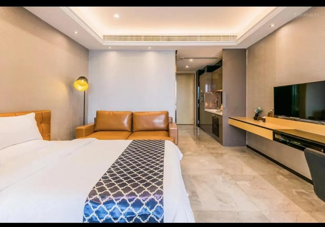 Bed in Green Lemon Tree International Apartment - Beijing Road Jiedeng Metropolis Branch