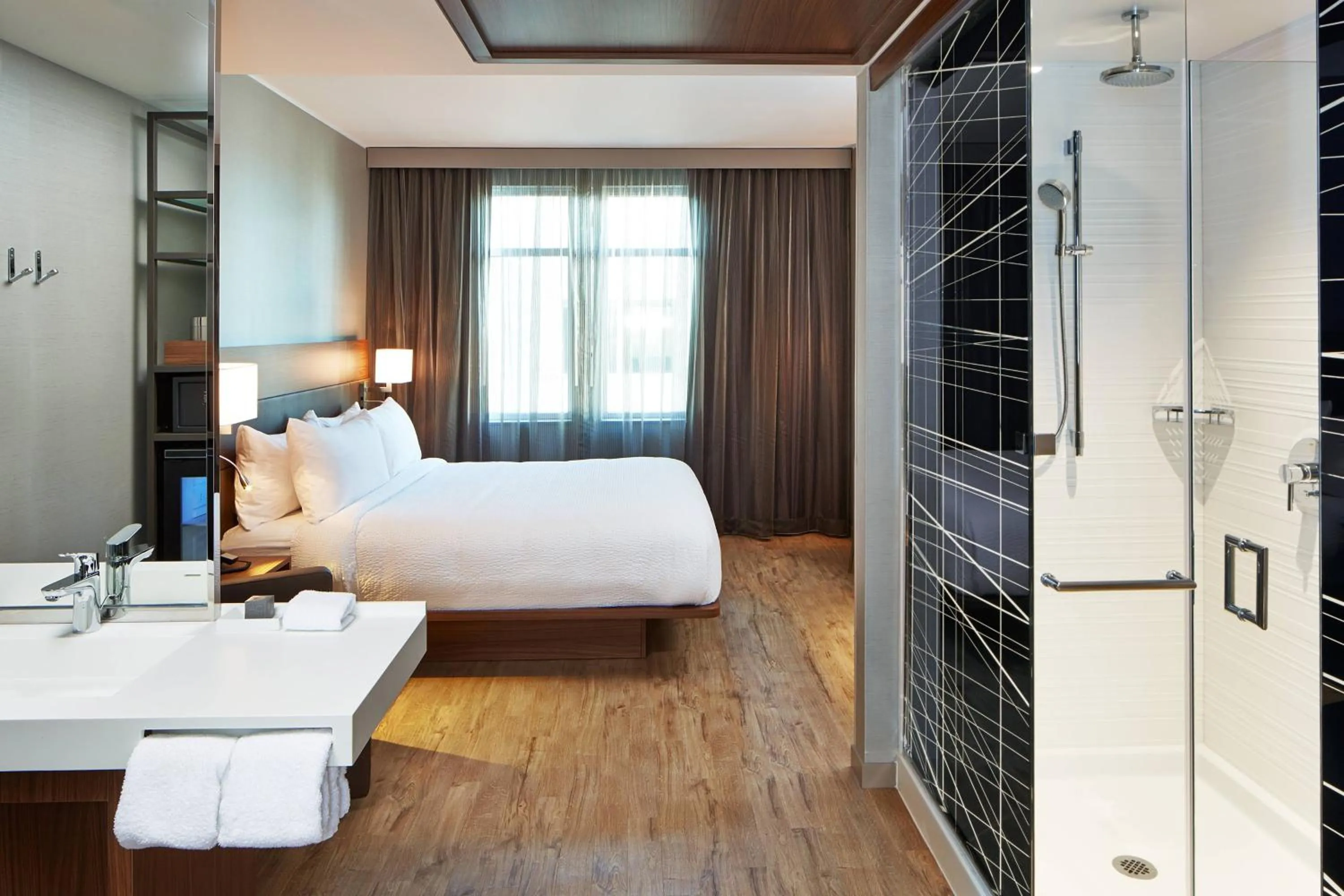 Photo of the whole room, Bed in AC Hotel by Marriott Portland Downtown, OR