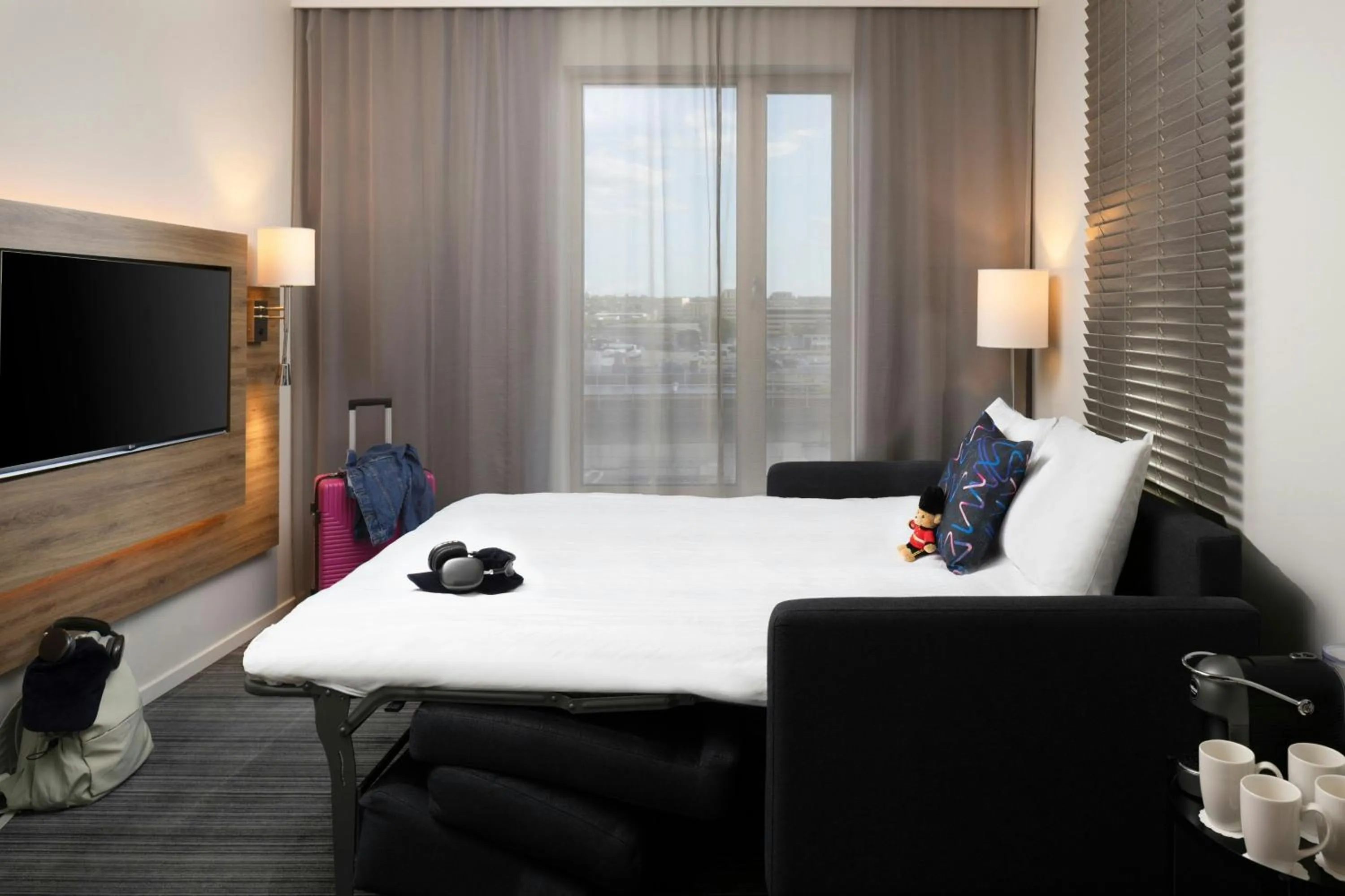 Photo of the whole room, Bed in Moxy London Excel