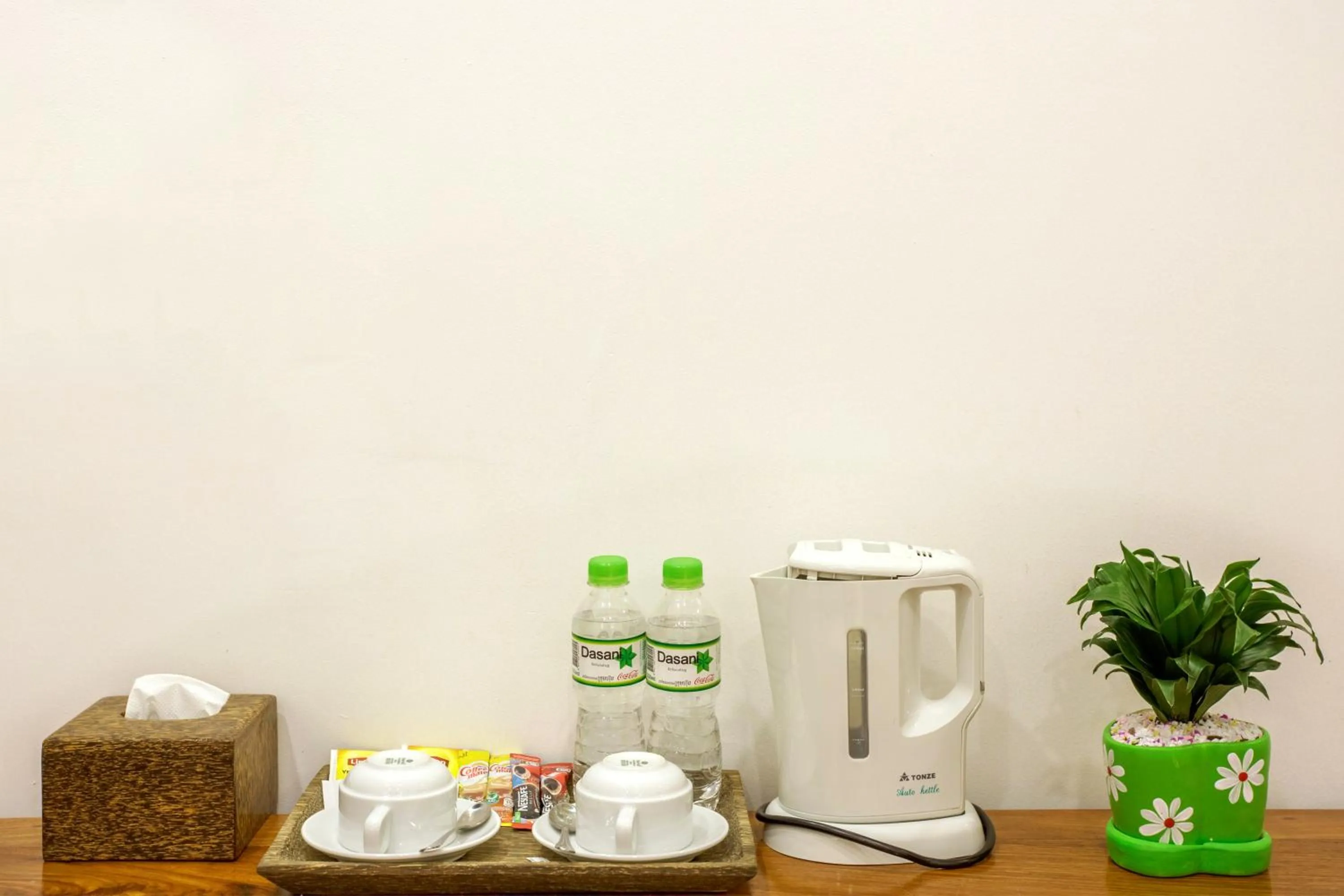 Coffee/tea facilities in The One by Nika