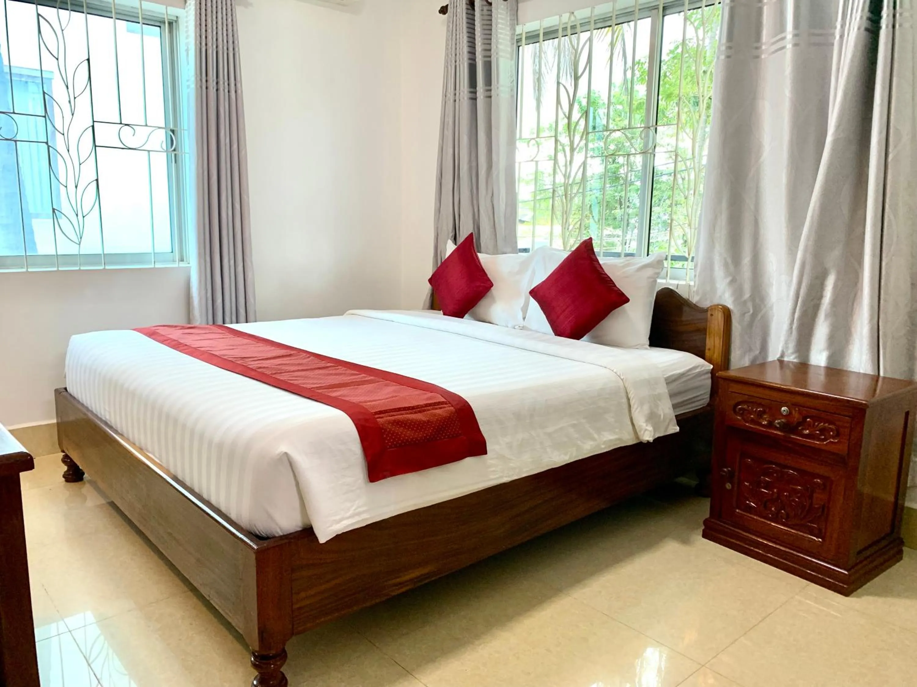 Garden view, Bed in The One by Nika