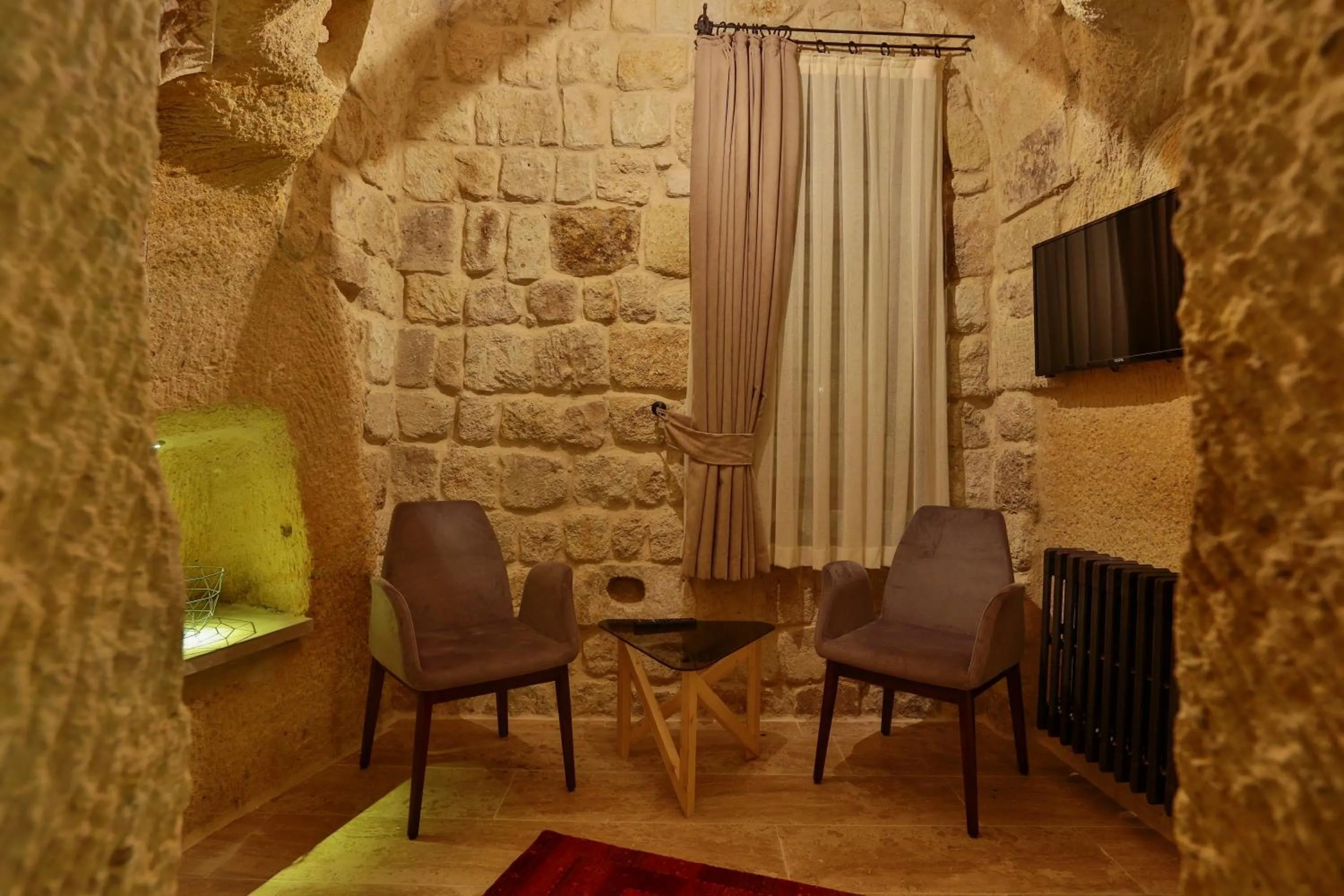 Living room in Acropolis Cave Suite