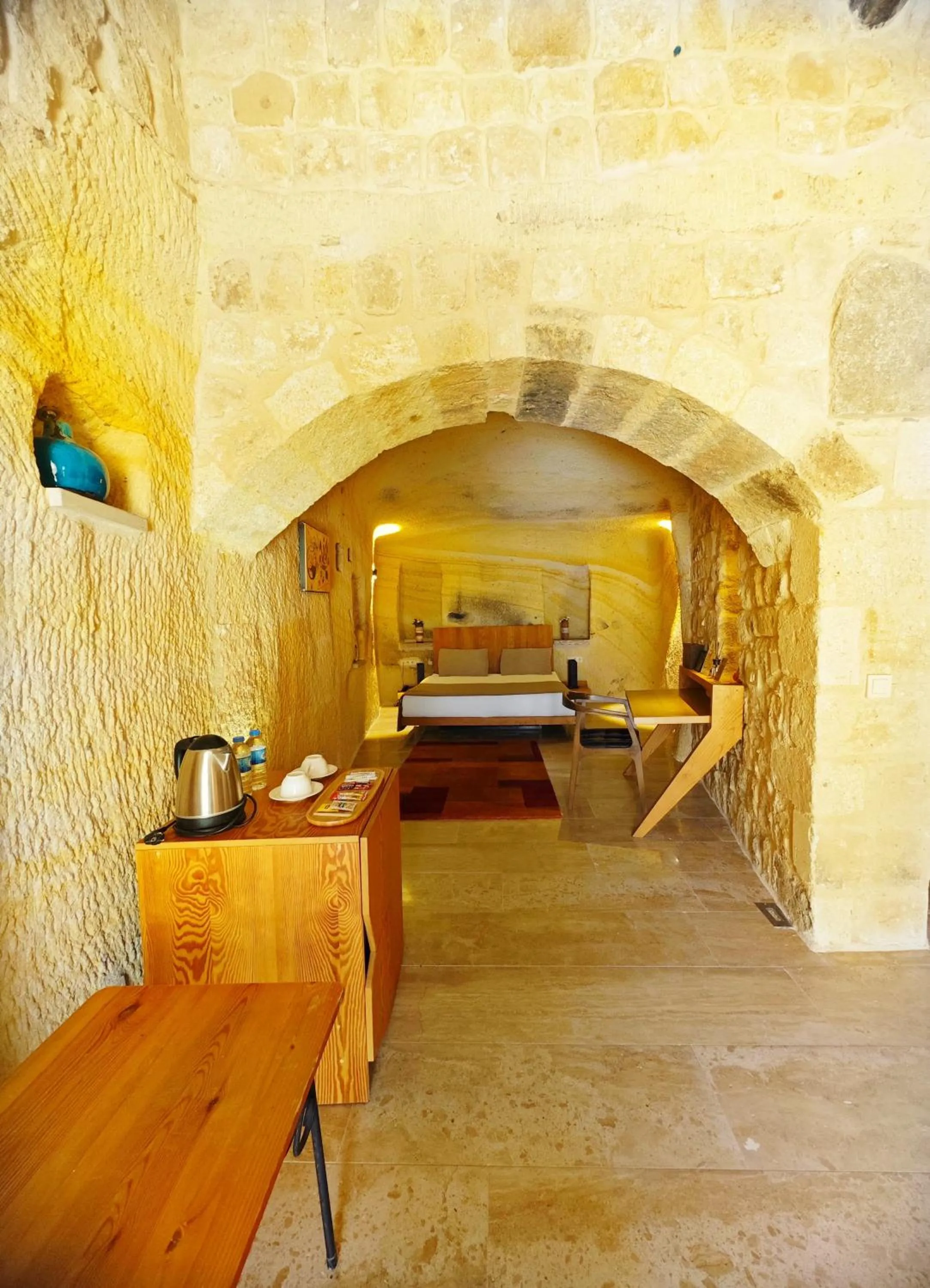 Bedroom in Acropolis Cave Suite