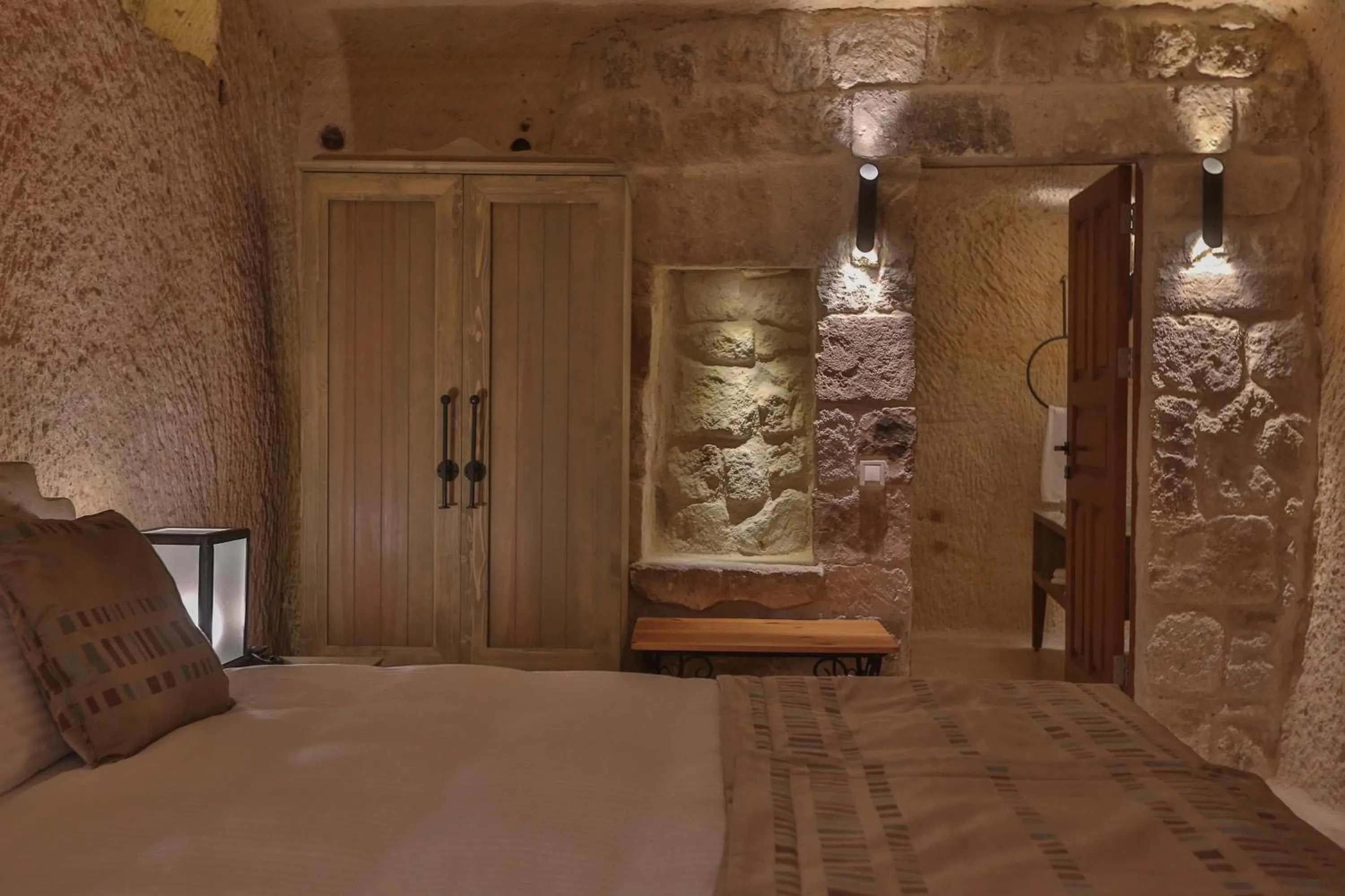 Bed in Acropolis Cave Suite