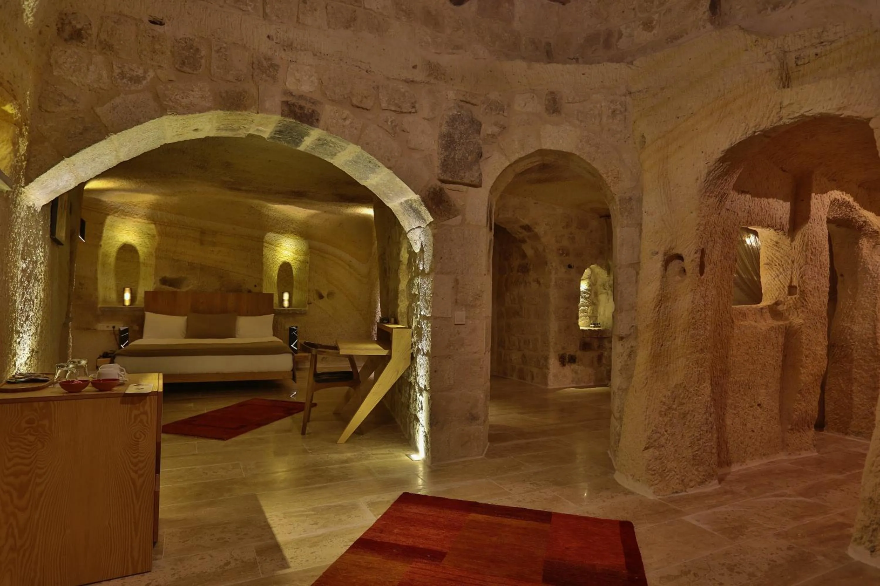 Bed in Acropolis Cave Suite