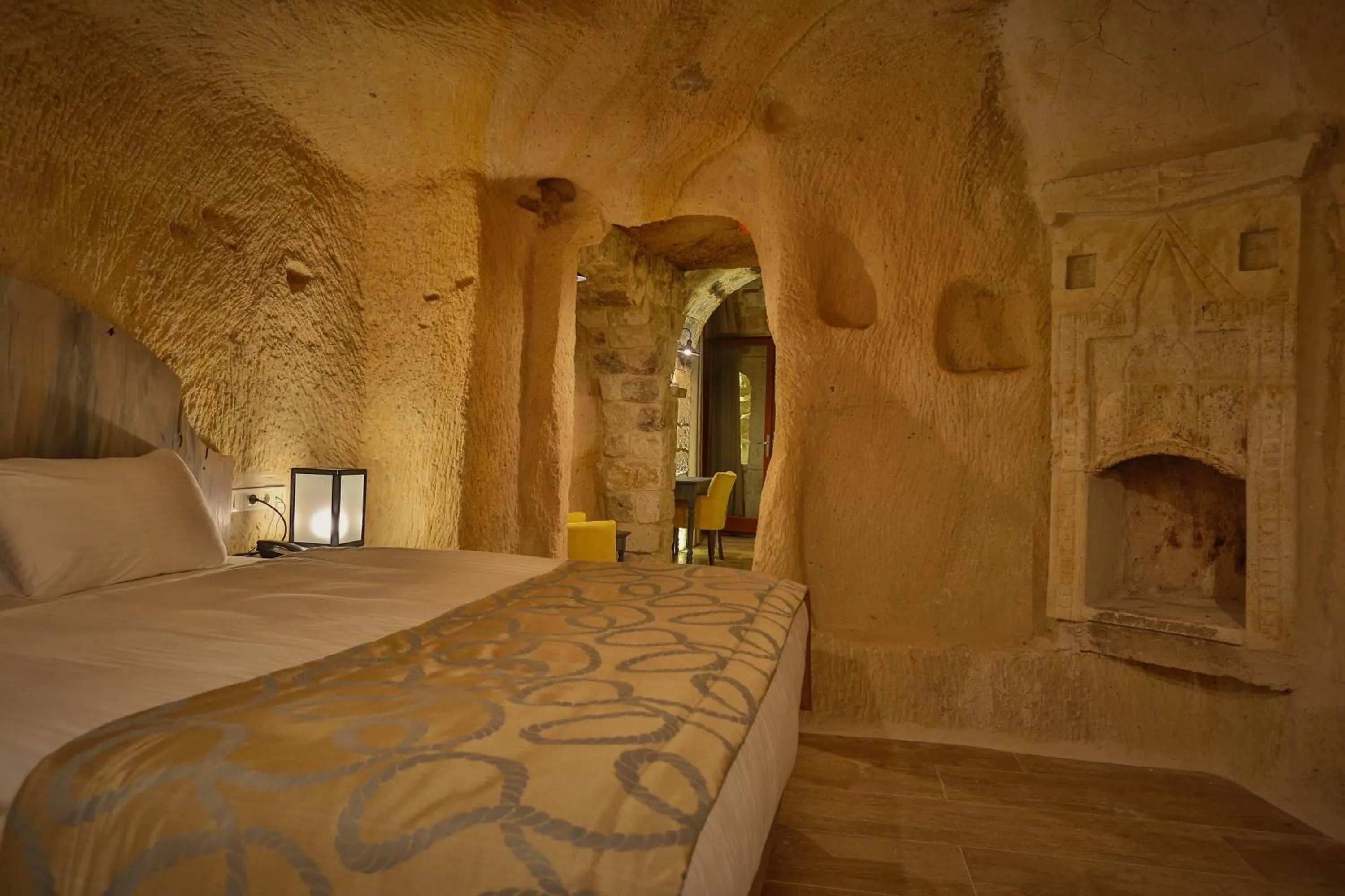 Bed in Acropolis Cave Suite