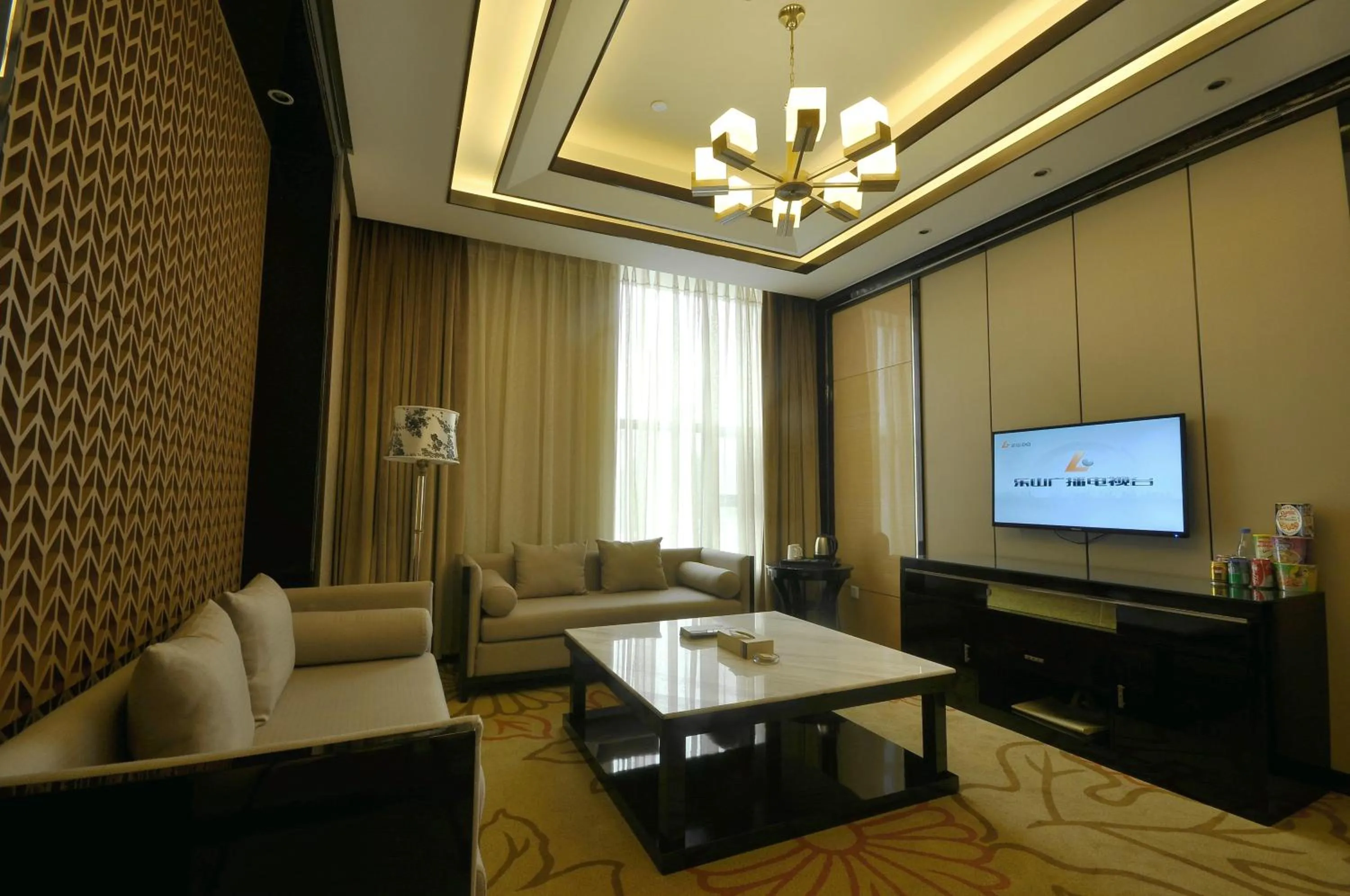 Living room in Jin-Tai Holiday Hotel