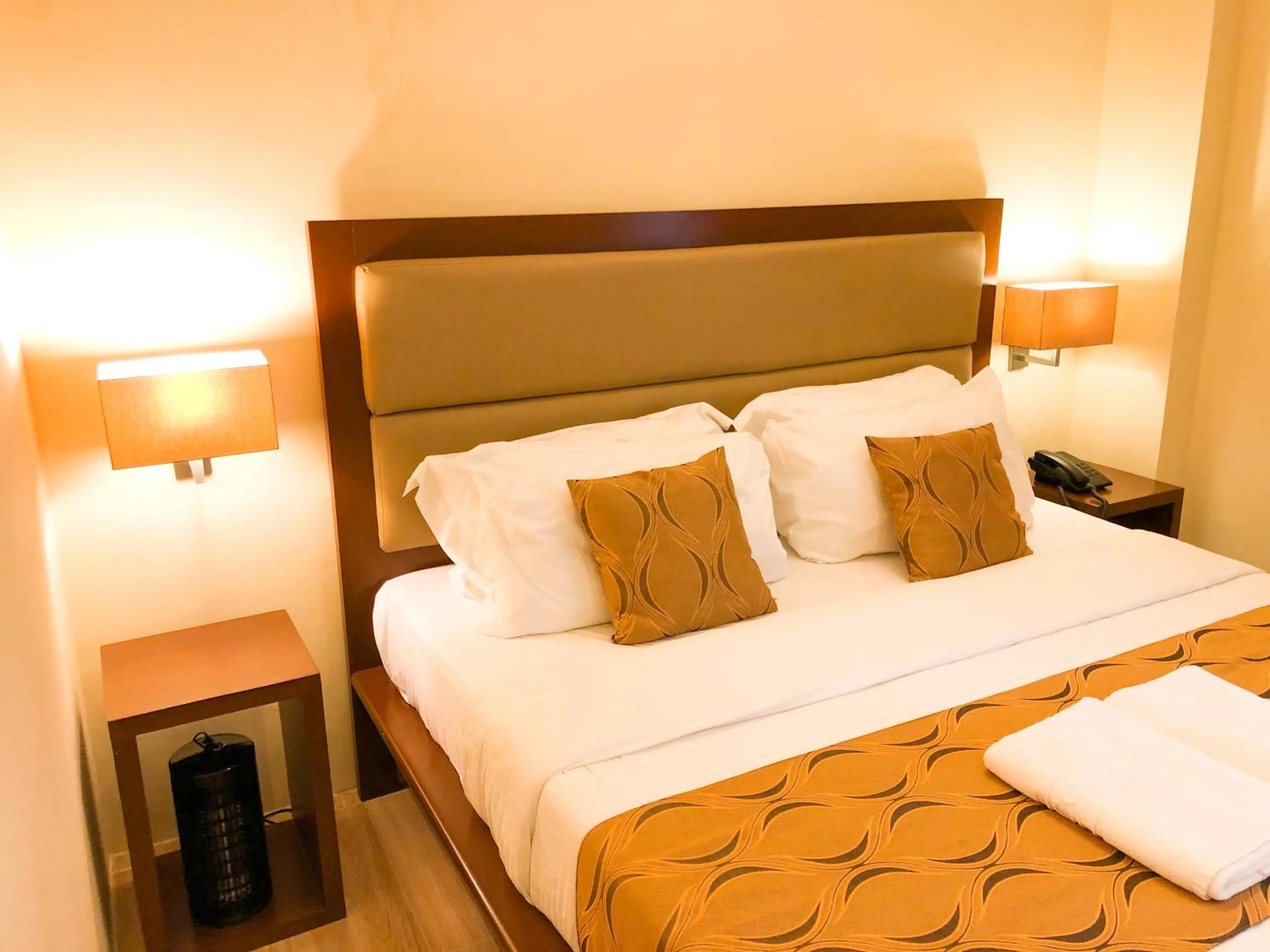 Bed in The Piccolo Hotel of Boracay