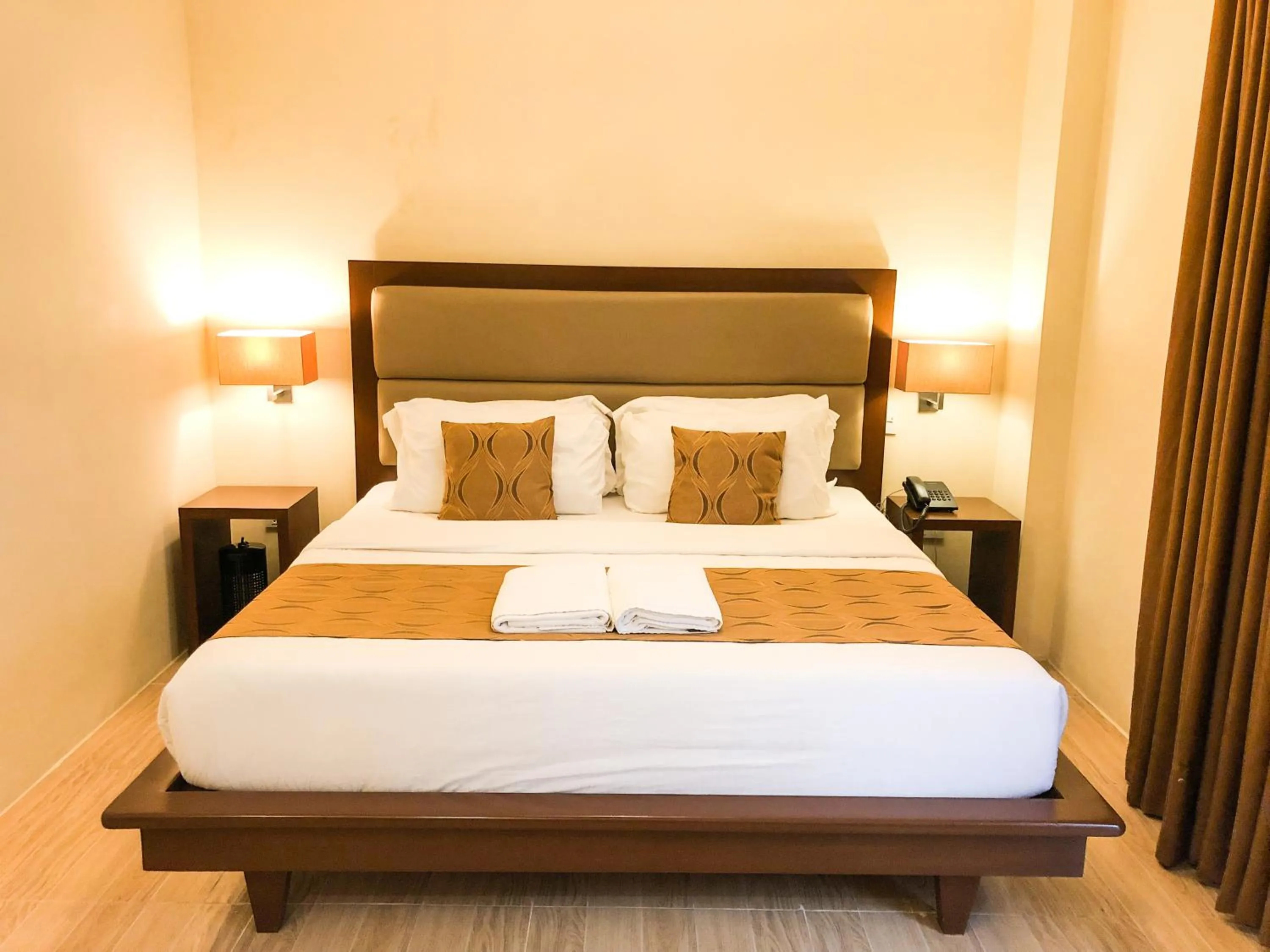 Bed in The Piccolo Hotel of Boracay