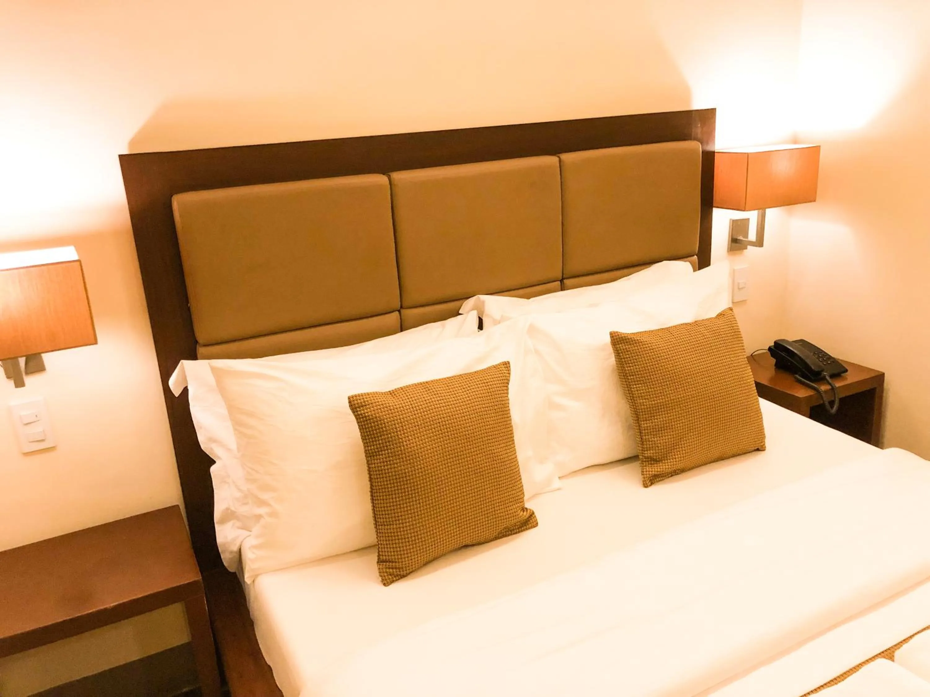 Bed in The Piccolo Hotel of Boracay