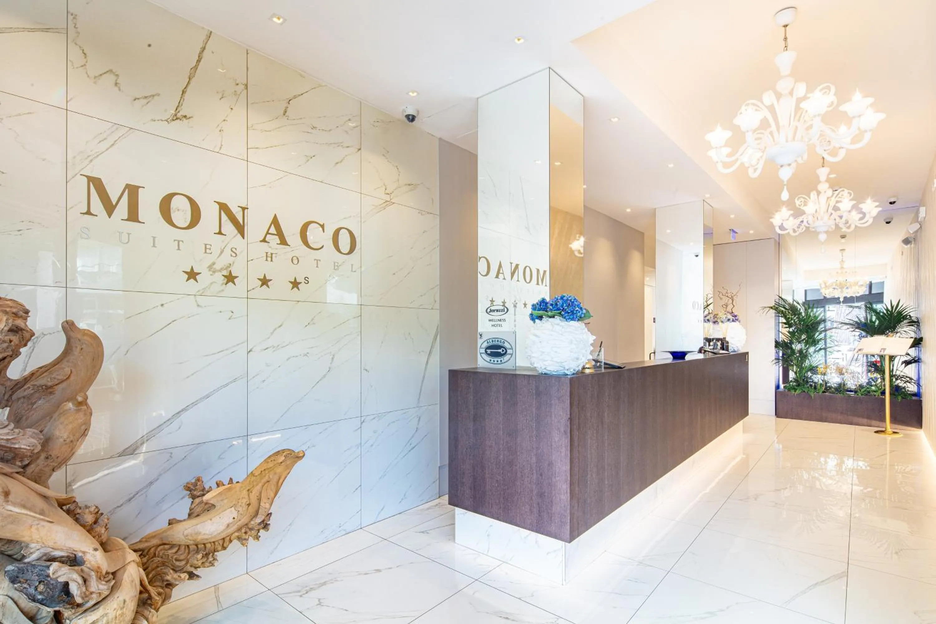 Lobby or reception in Monaco Suites Hotel