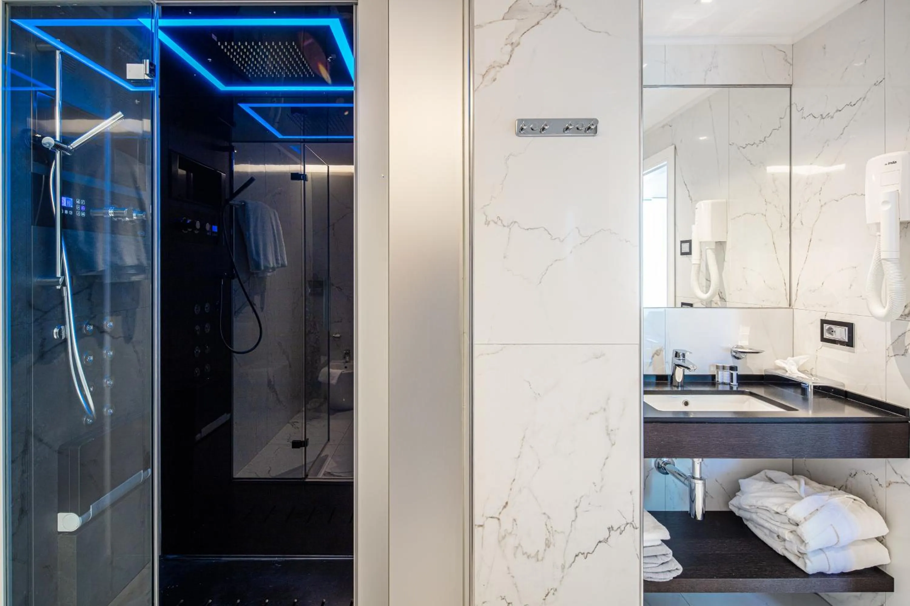 Bathroom in Monaco Suites Hotel