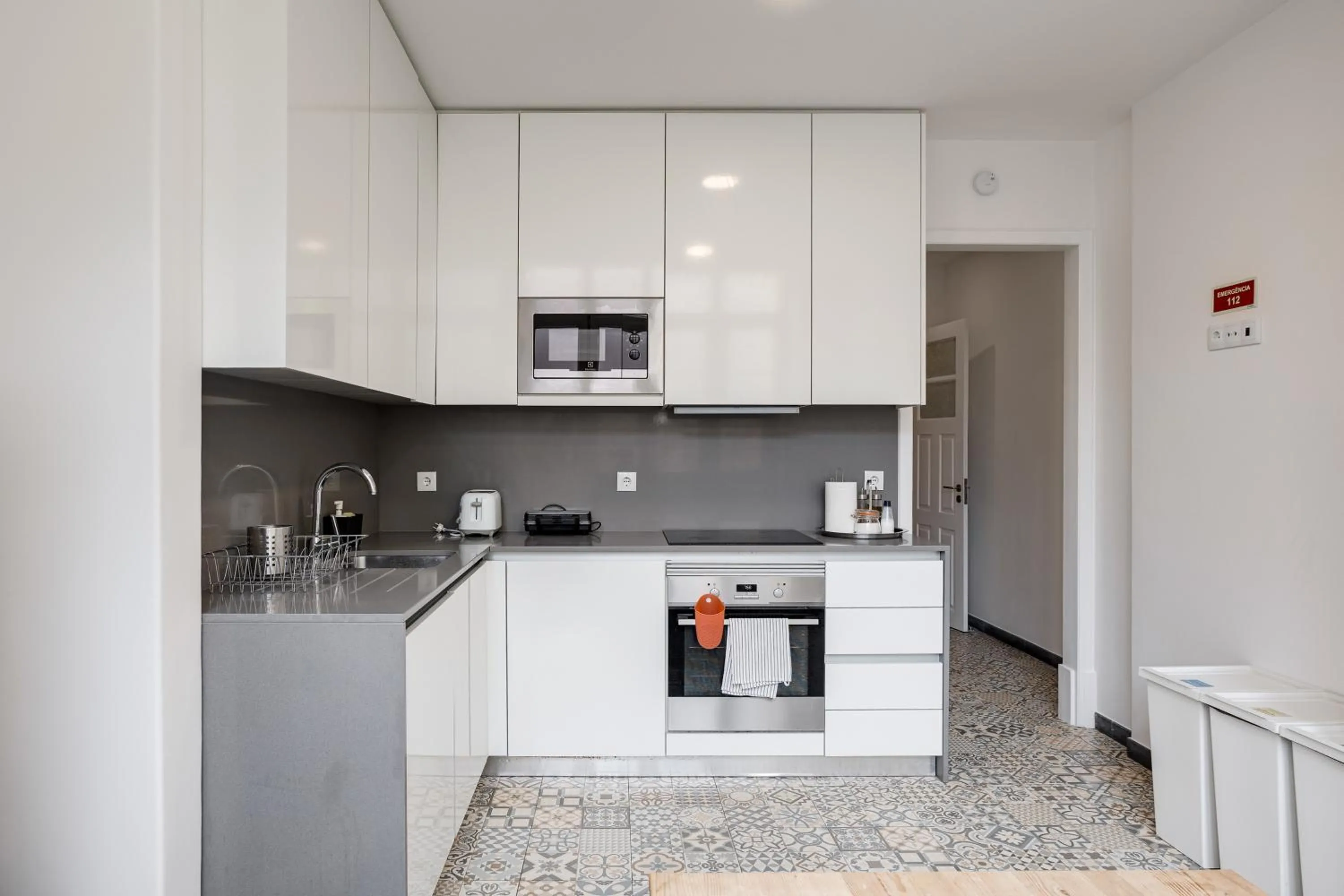 Kitchen or kitchenette in Home Out Rooms & Apartments