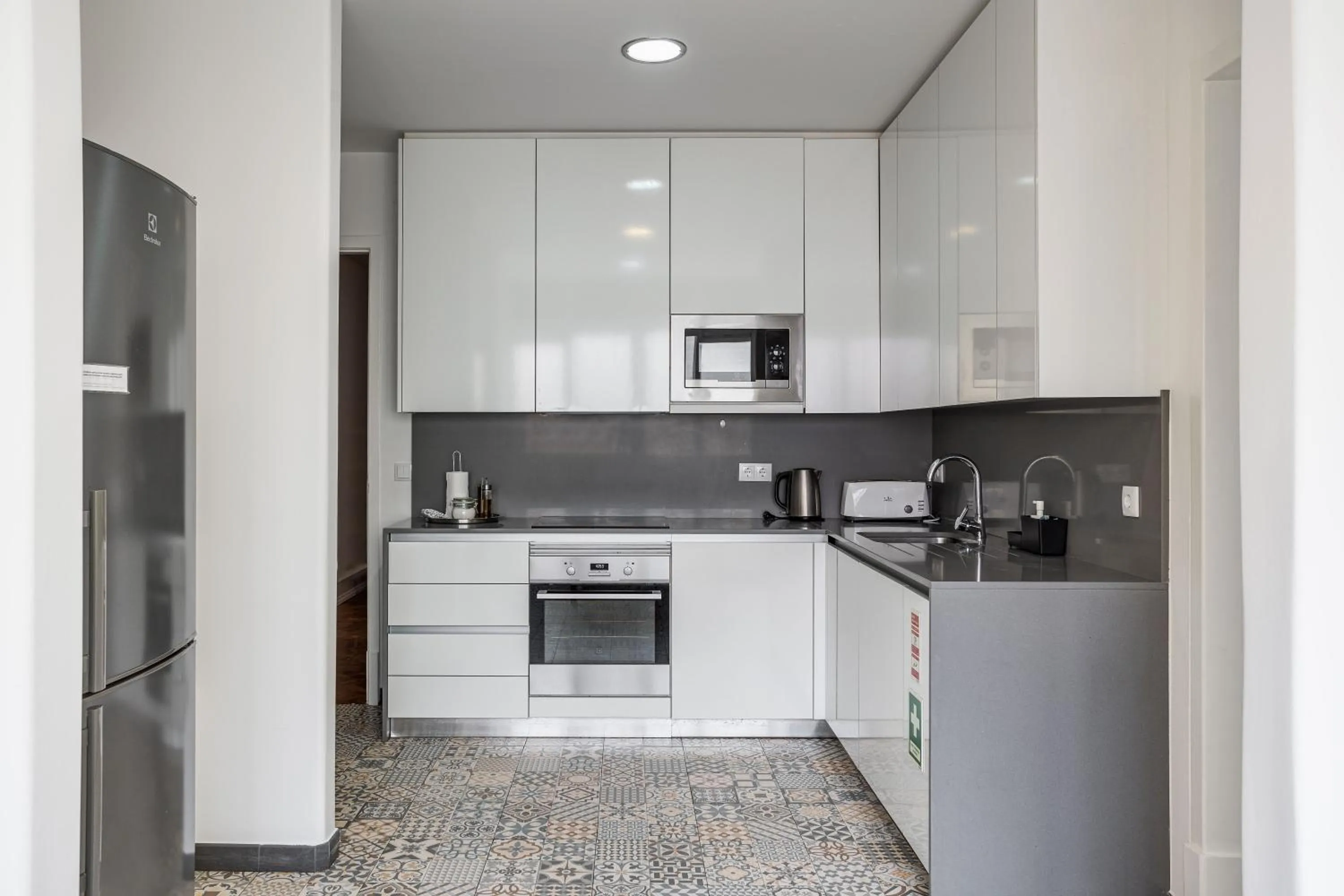 Kitchen or kitchenette in Home Out Rooms & Apartments