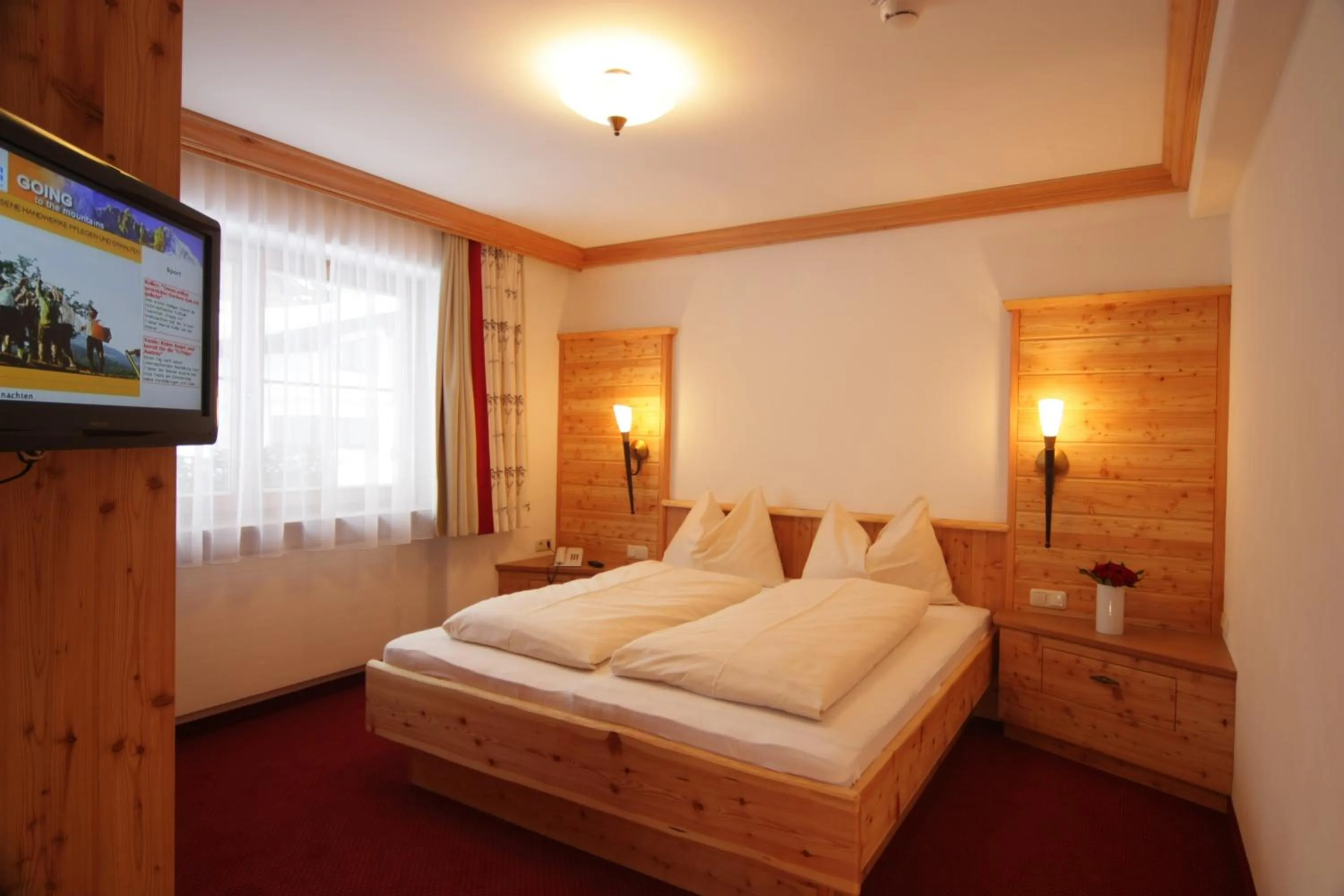 Bed in Hotel Ritterhof Ellmau