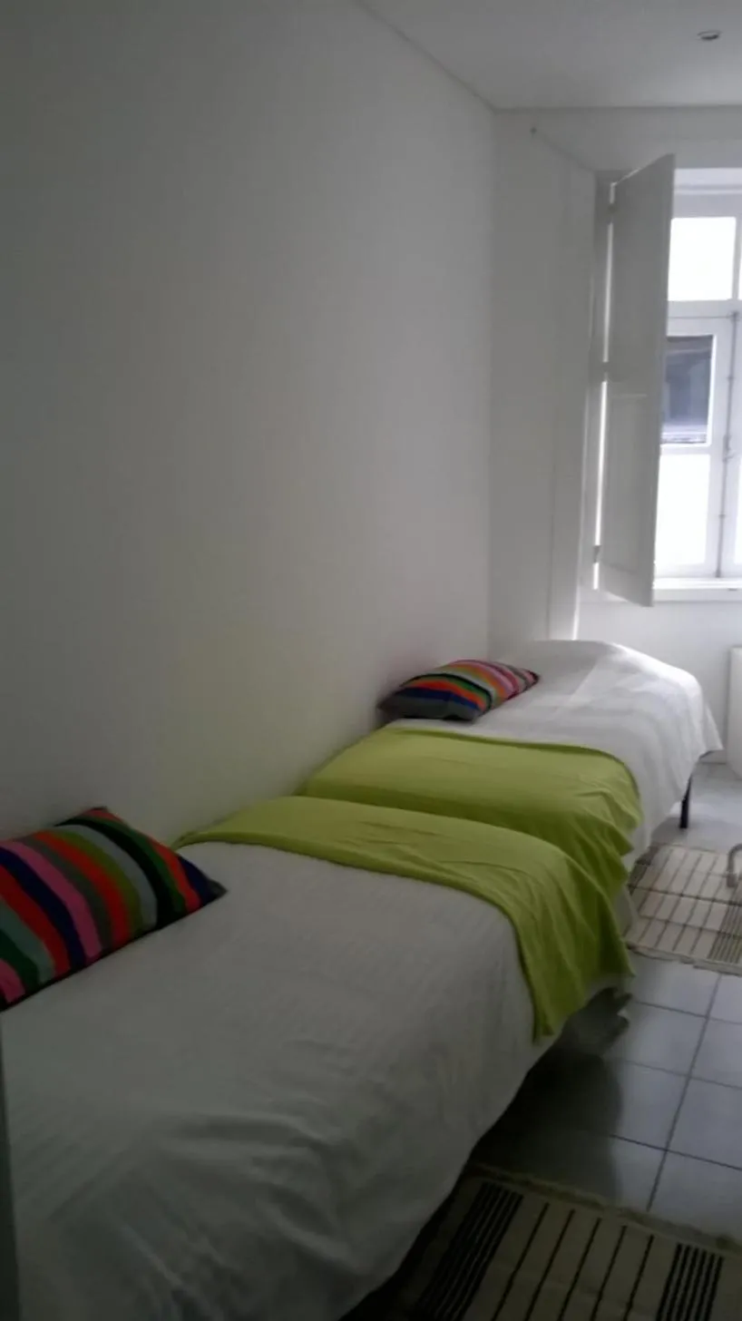 Bed in Down Bonjardim Apartments