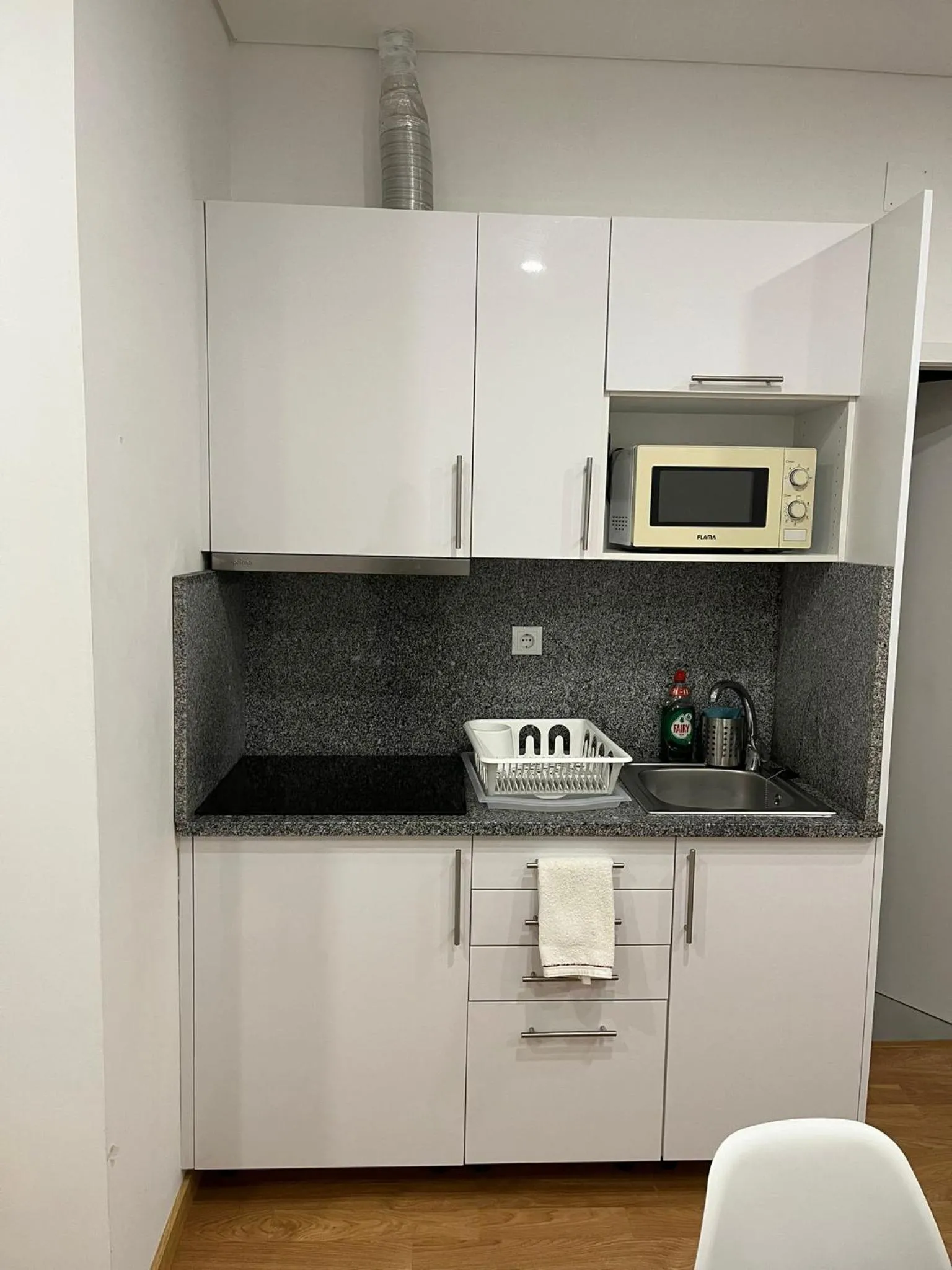 Kitchen or kitchenette in Down Bonjardim Apartments
