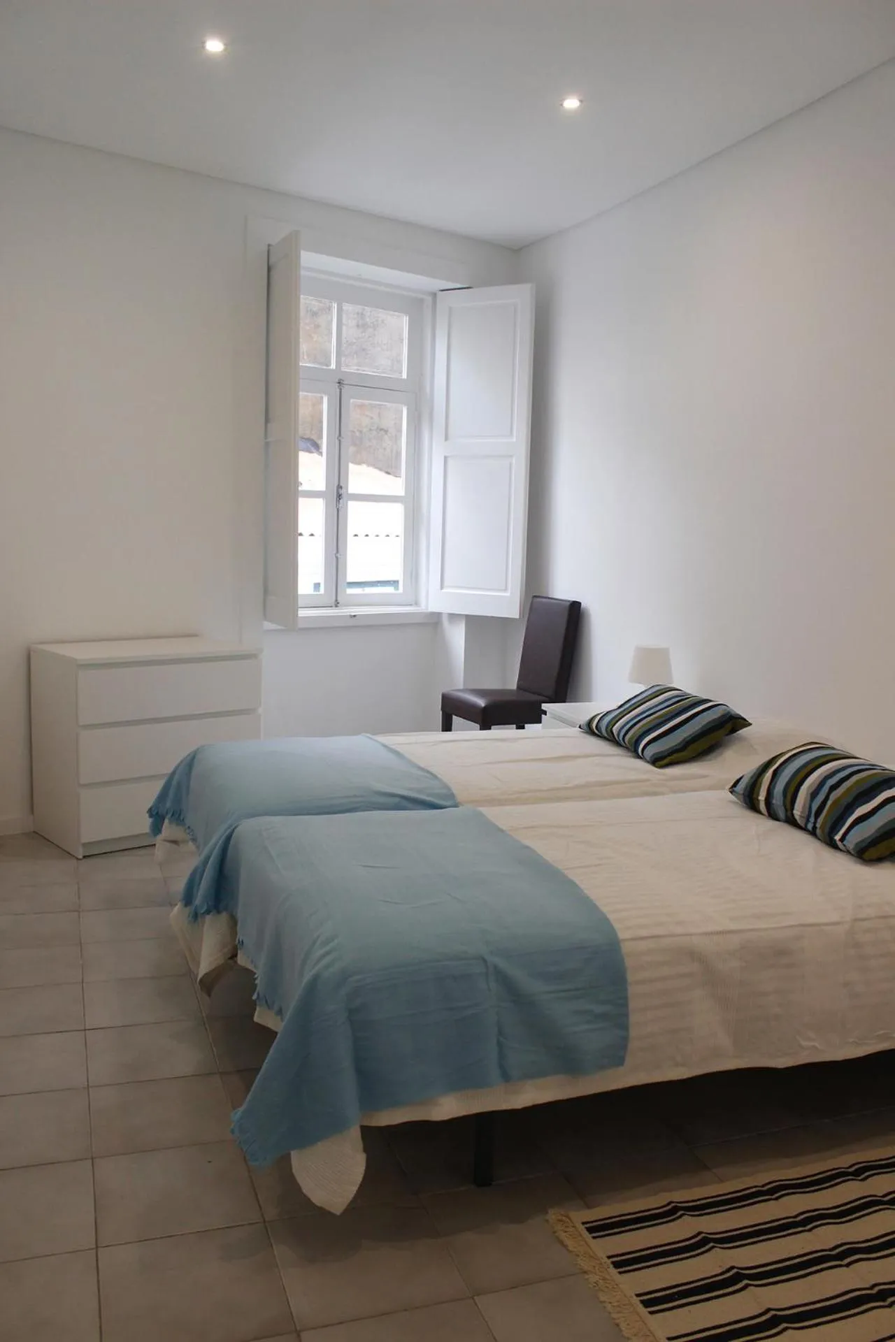 Bed in Down Bonjardim Apartments