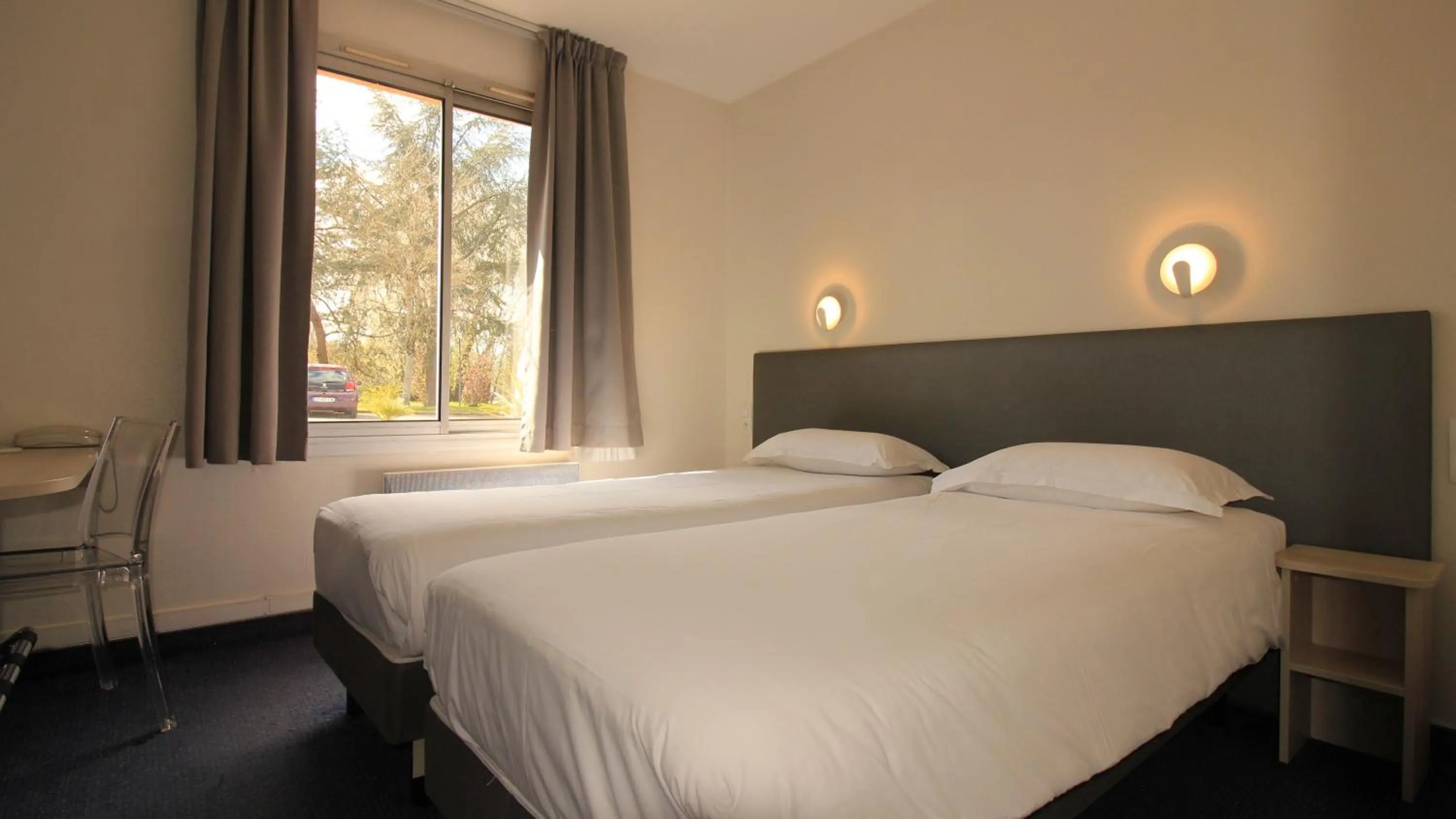 Bedroom, Bed in Logis Hôtel Lodge La Valette