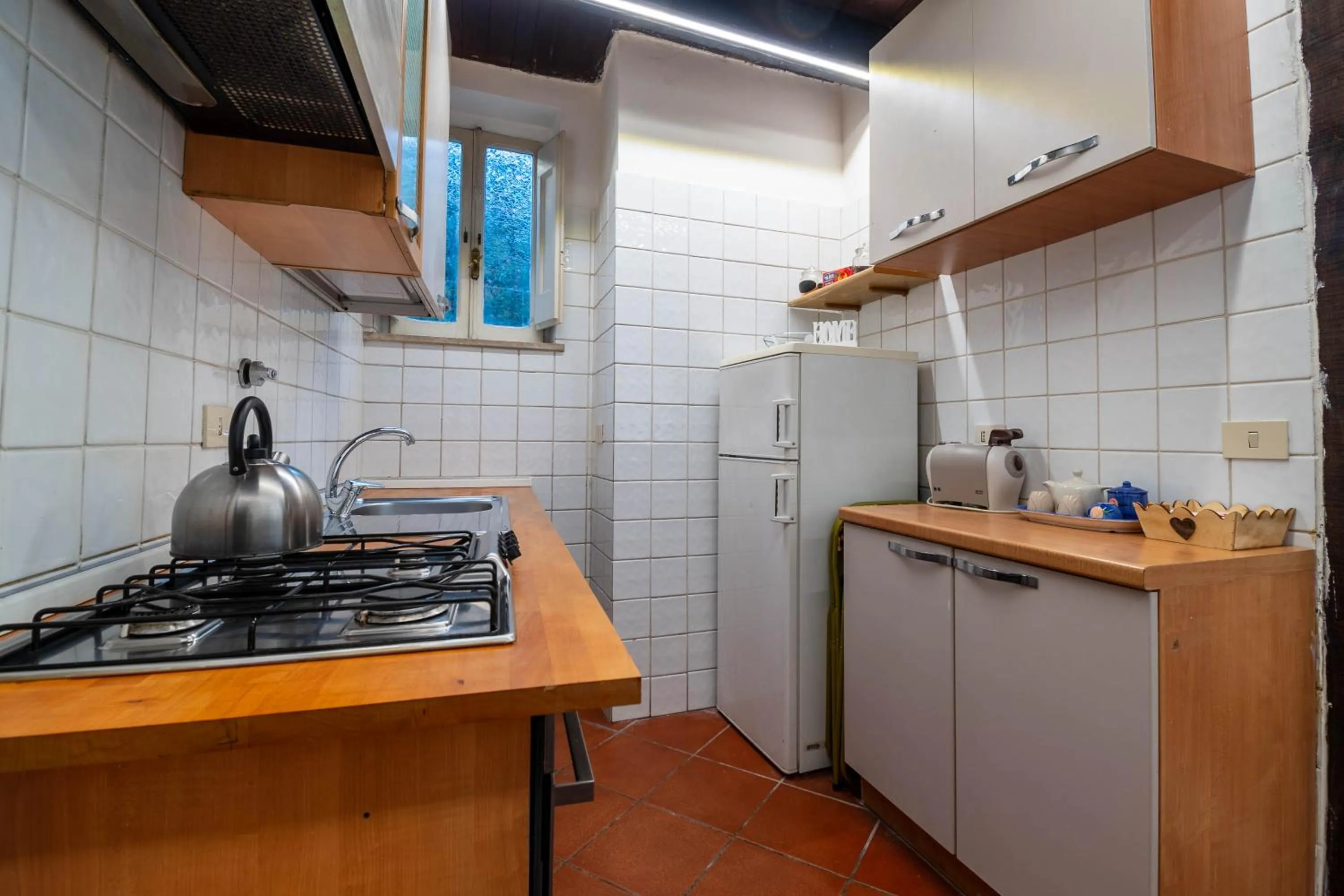 Kitchen or kitchenette in Casa Trasteverina