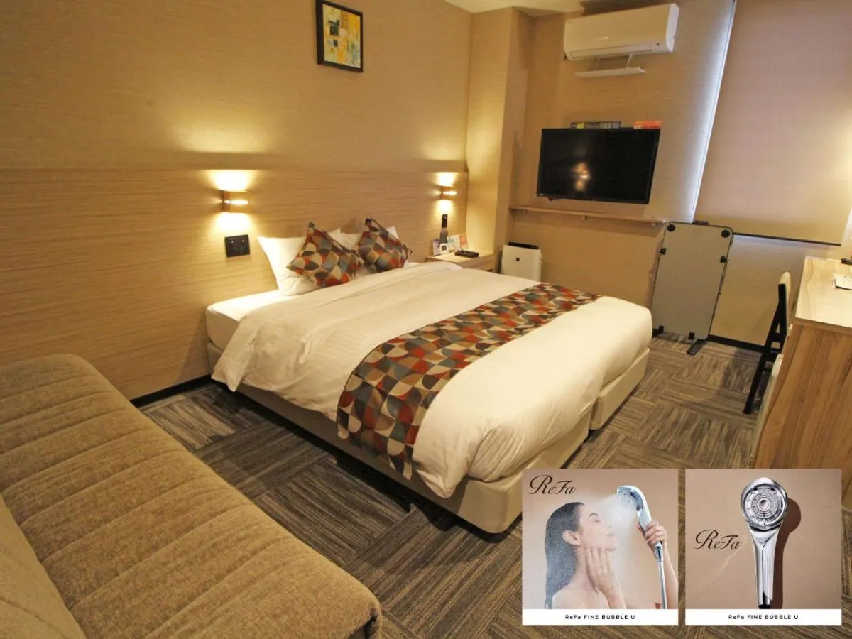 Bed in Astil Hotel Shinosaka Precious