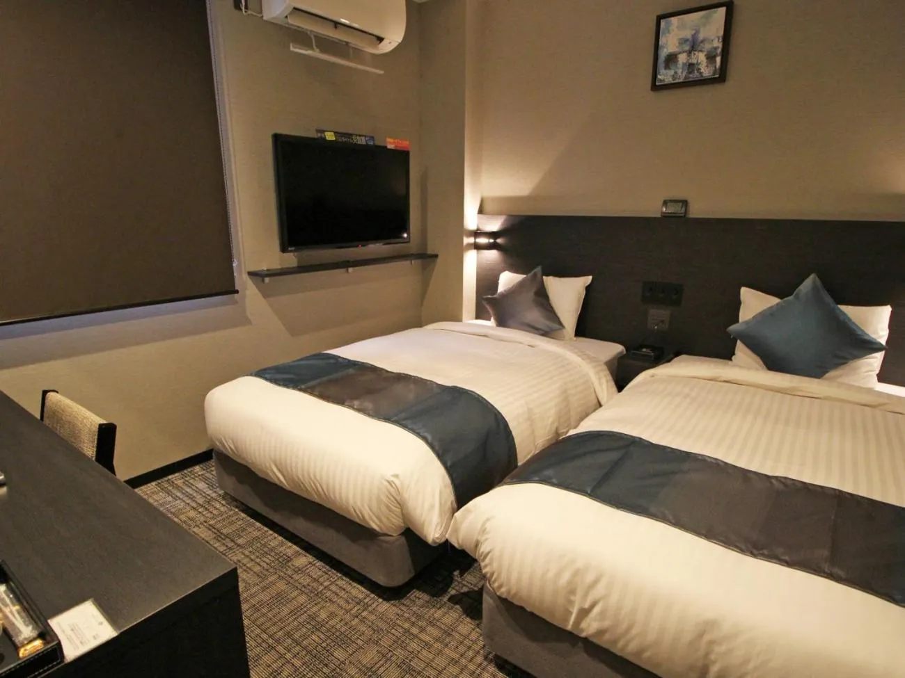 Bed in Astil Hotel Shinosaka Precious