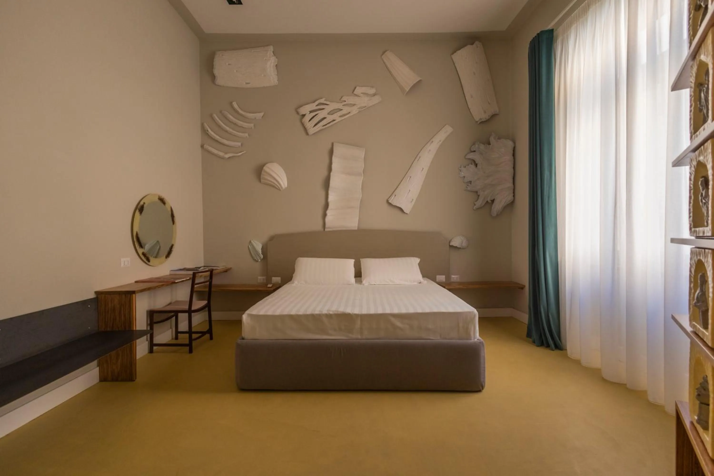 Bed in Atelier Inès Arts & Suites