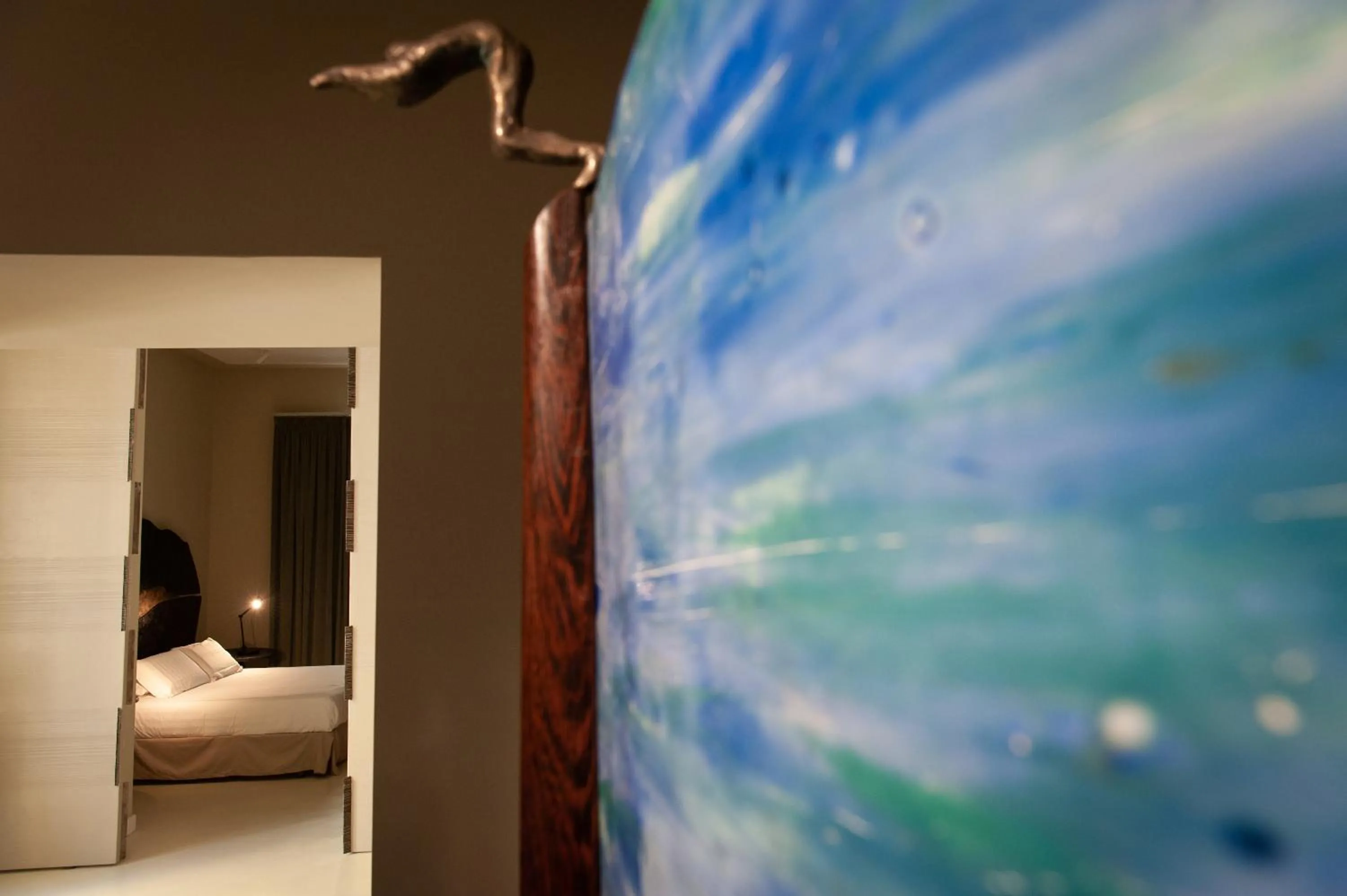 Bed in Atelier Inès Arts & Suites