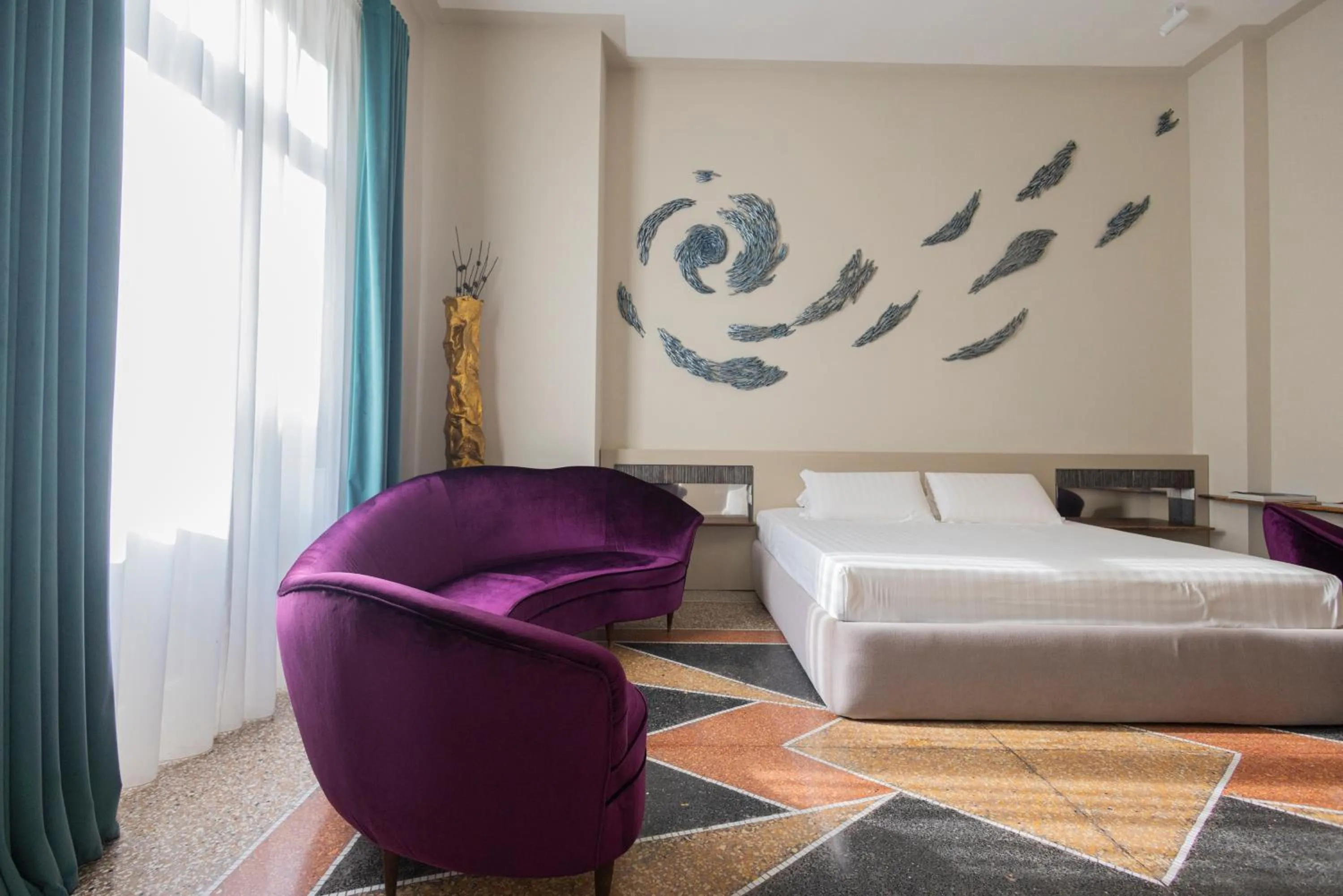 Bed in Atelier Inès Arts & Suites