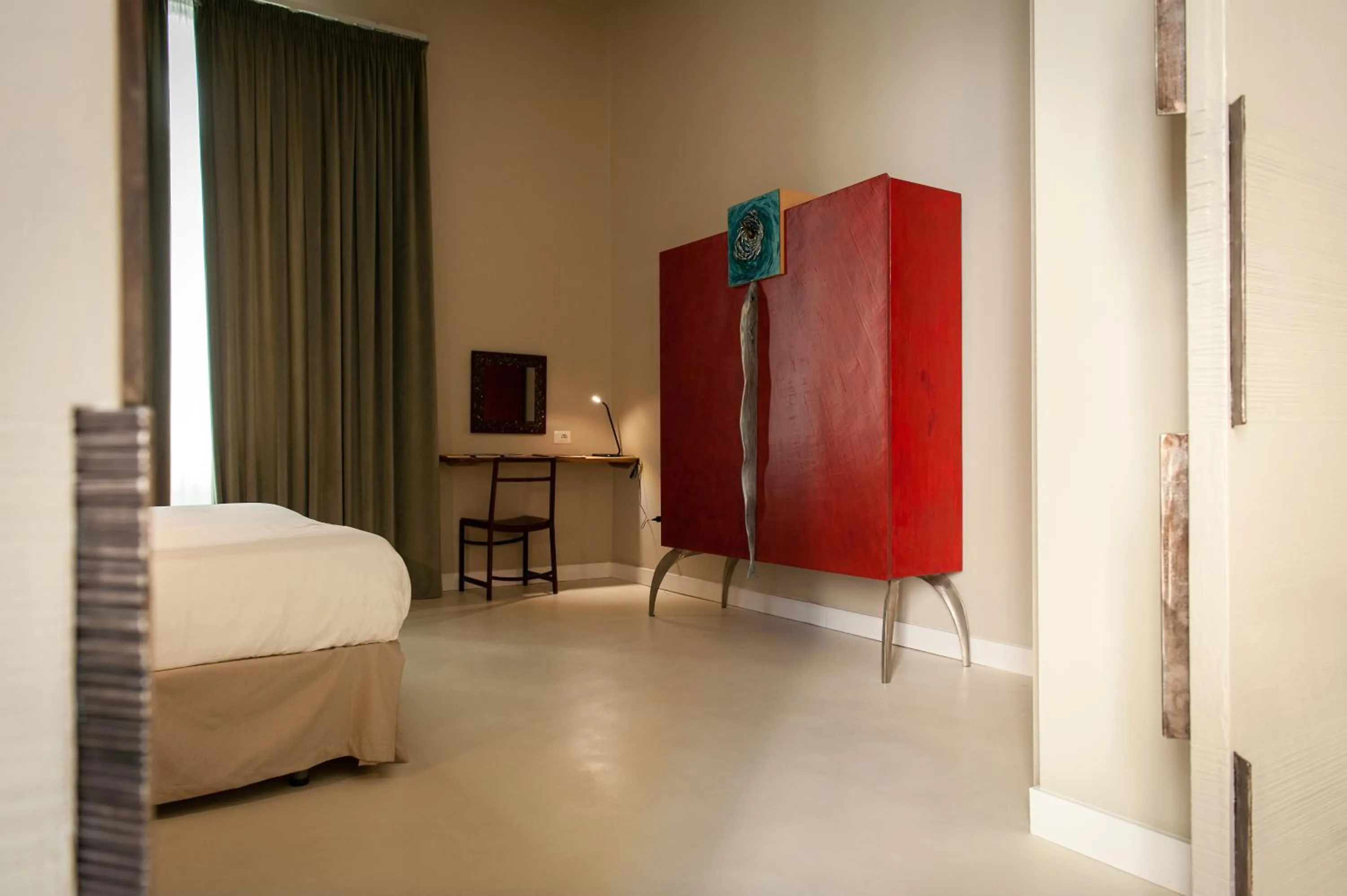 Bed in Atelier Inès Arts & Suites