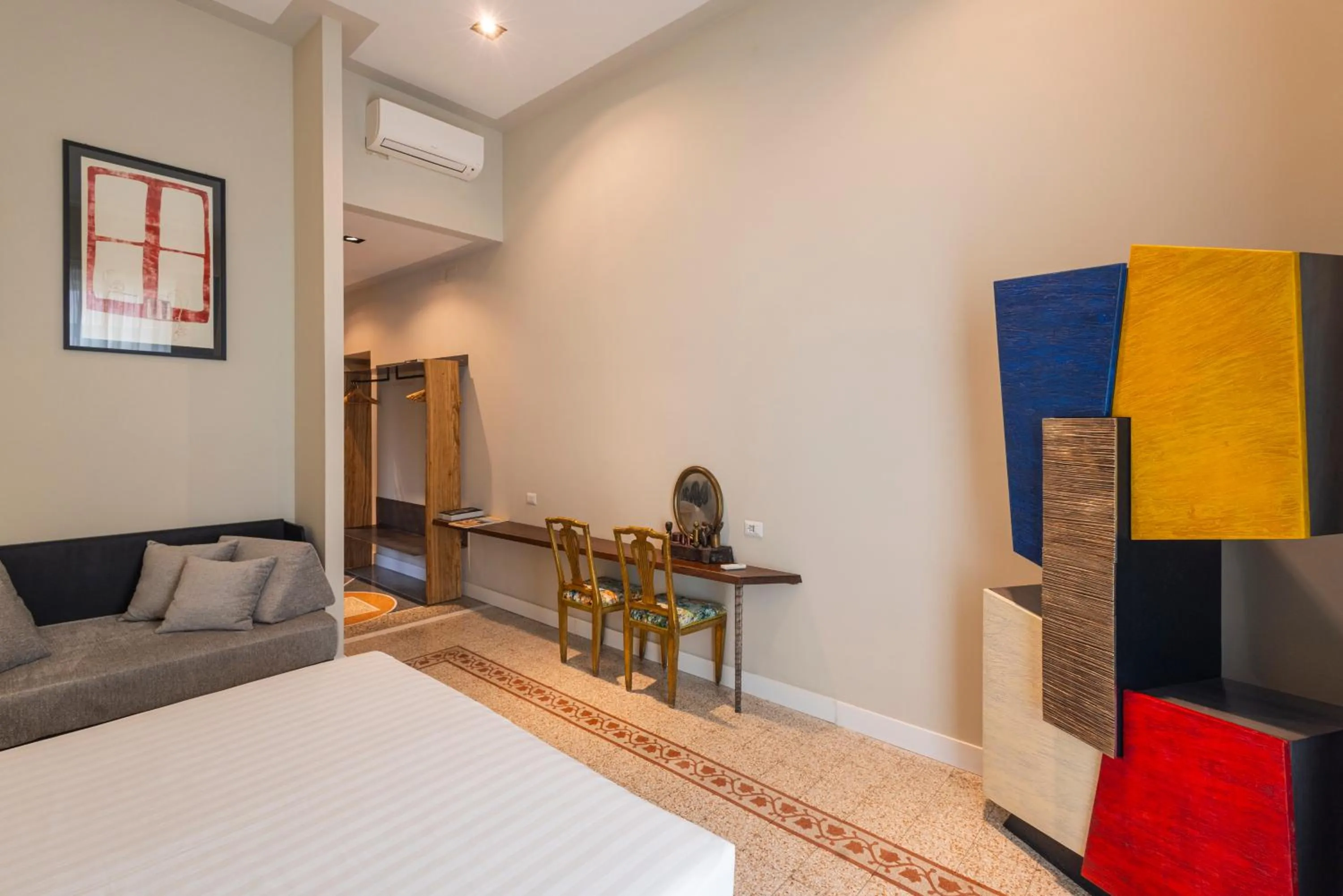 Bed in Atelier Inès Arts & Suites