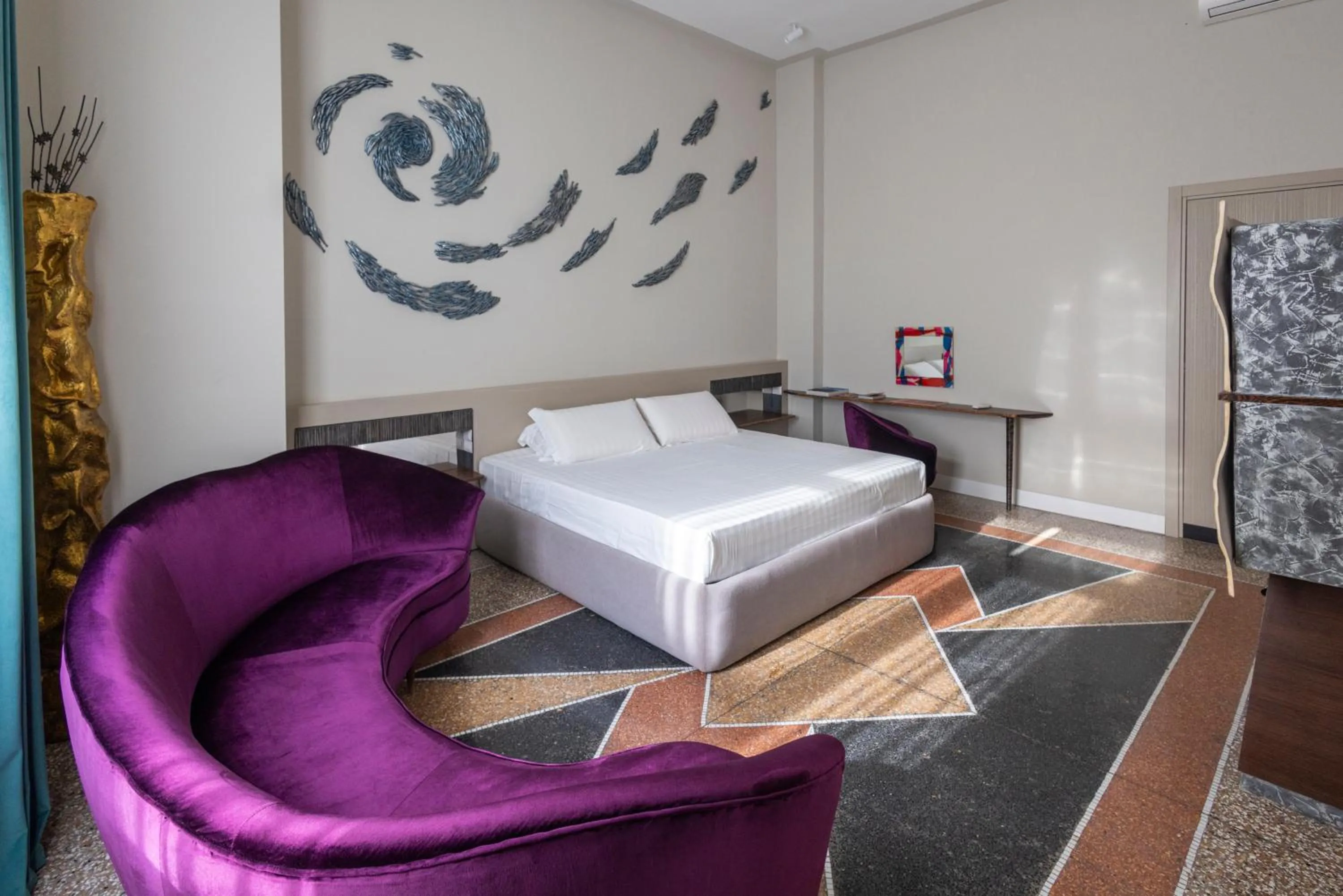 Bed in Atelier Inès Arts & Suites