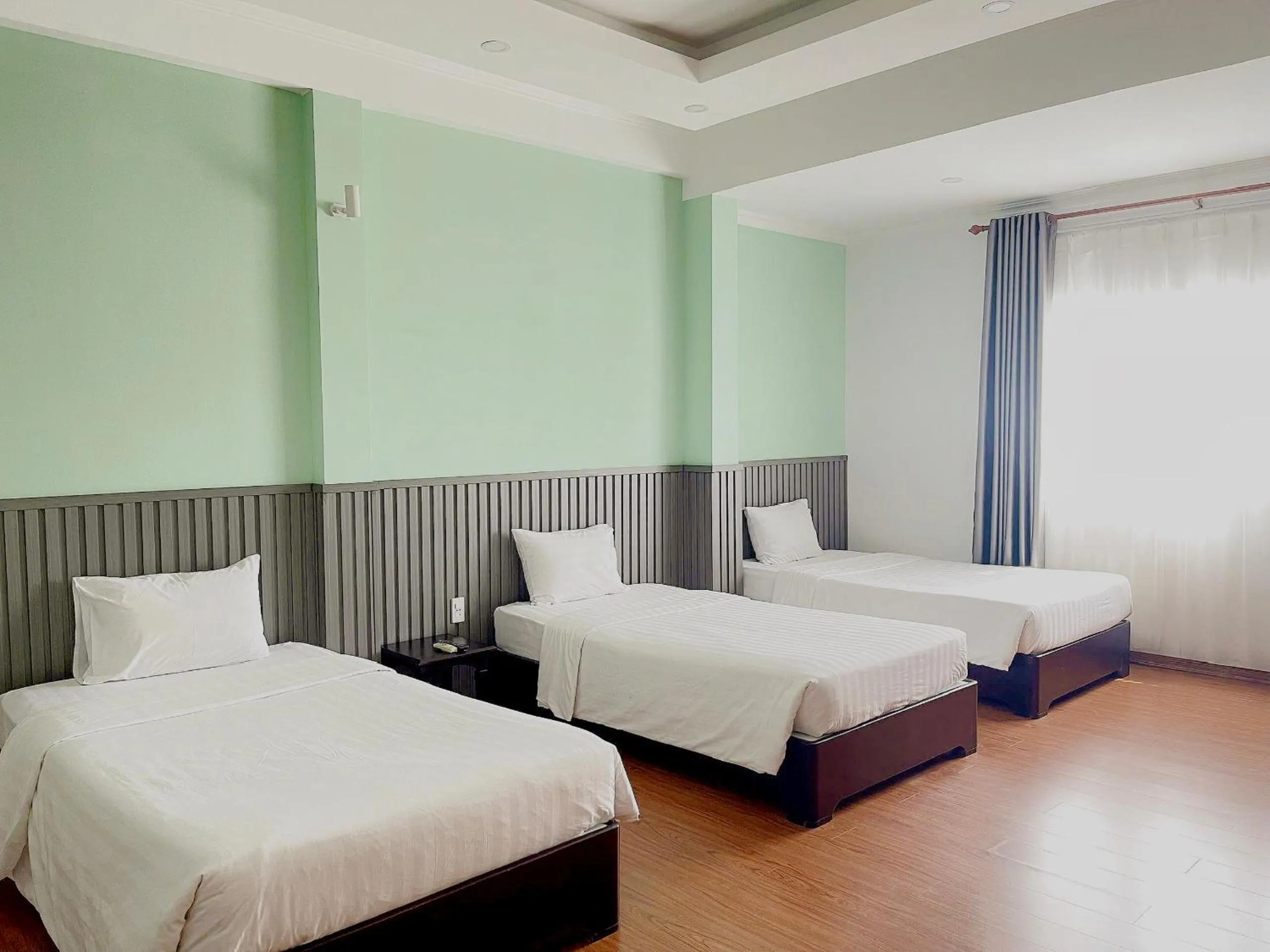 Bed in Tre Xanh Hotel