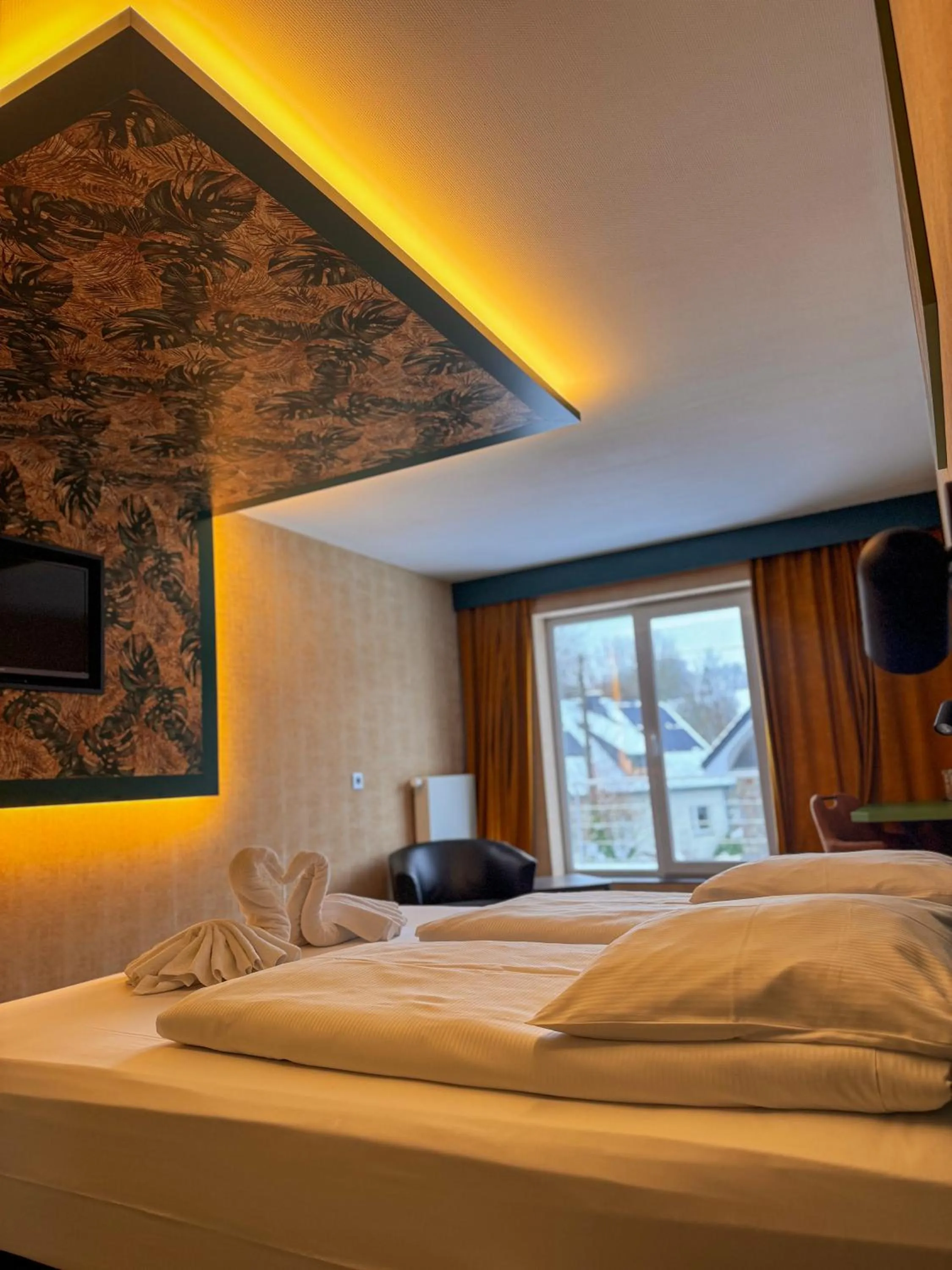 Bed in RAVeL Hotel Cyrano