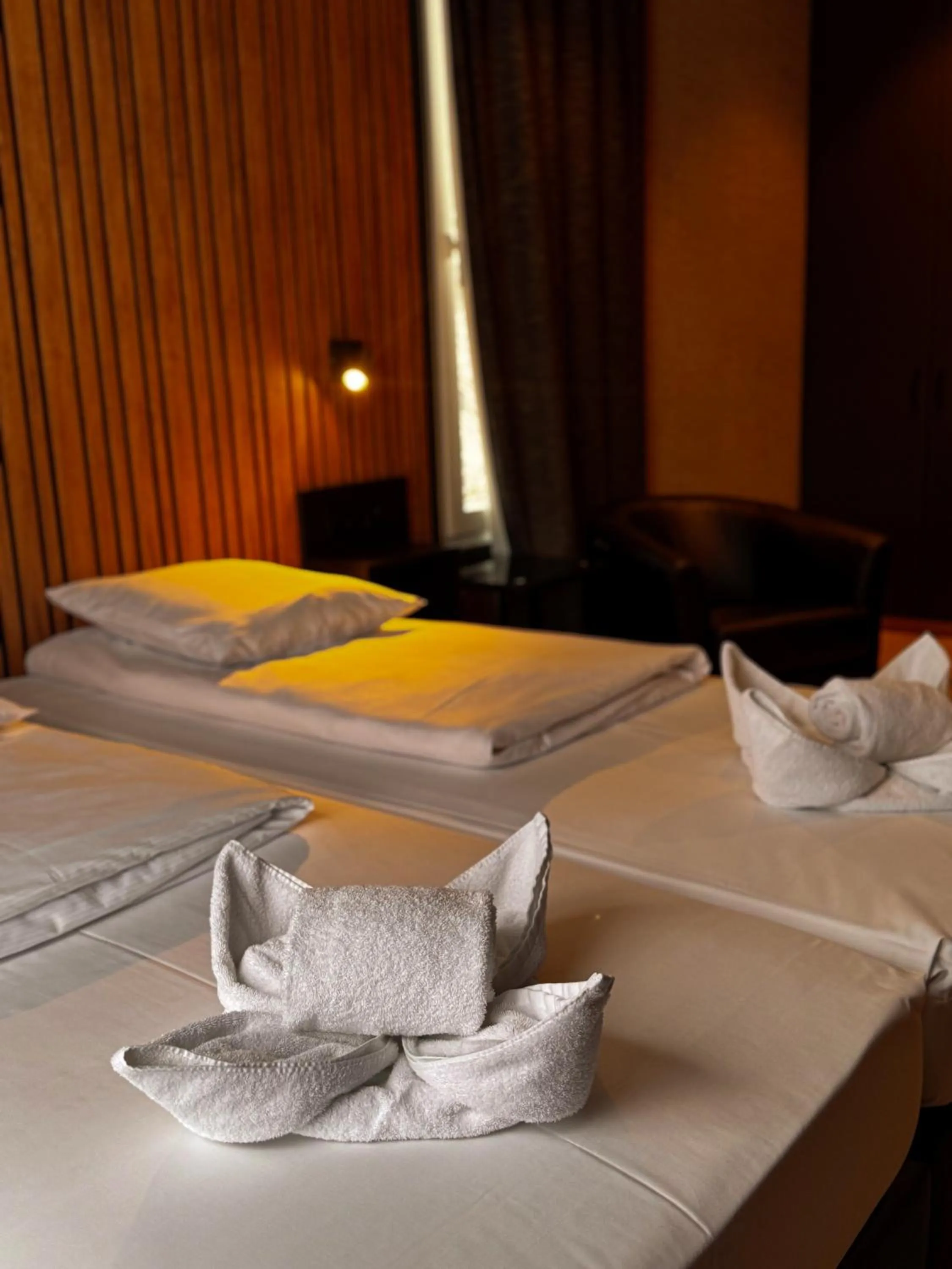 Bed in RAVeL Hotel Cyrano