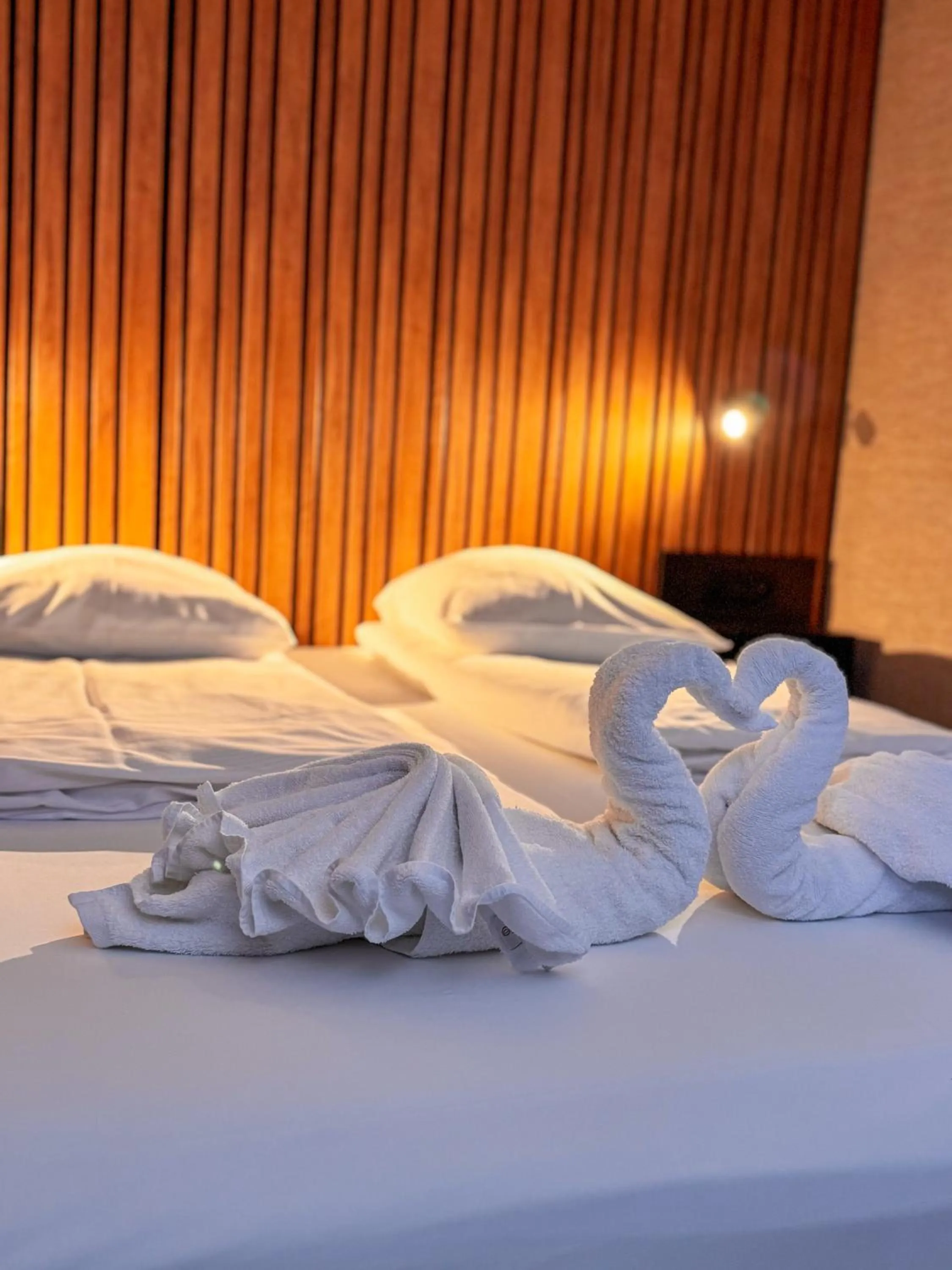 Bed in RAVeL Hotel Cyrano