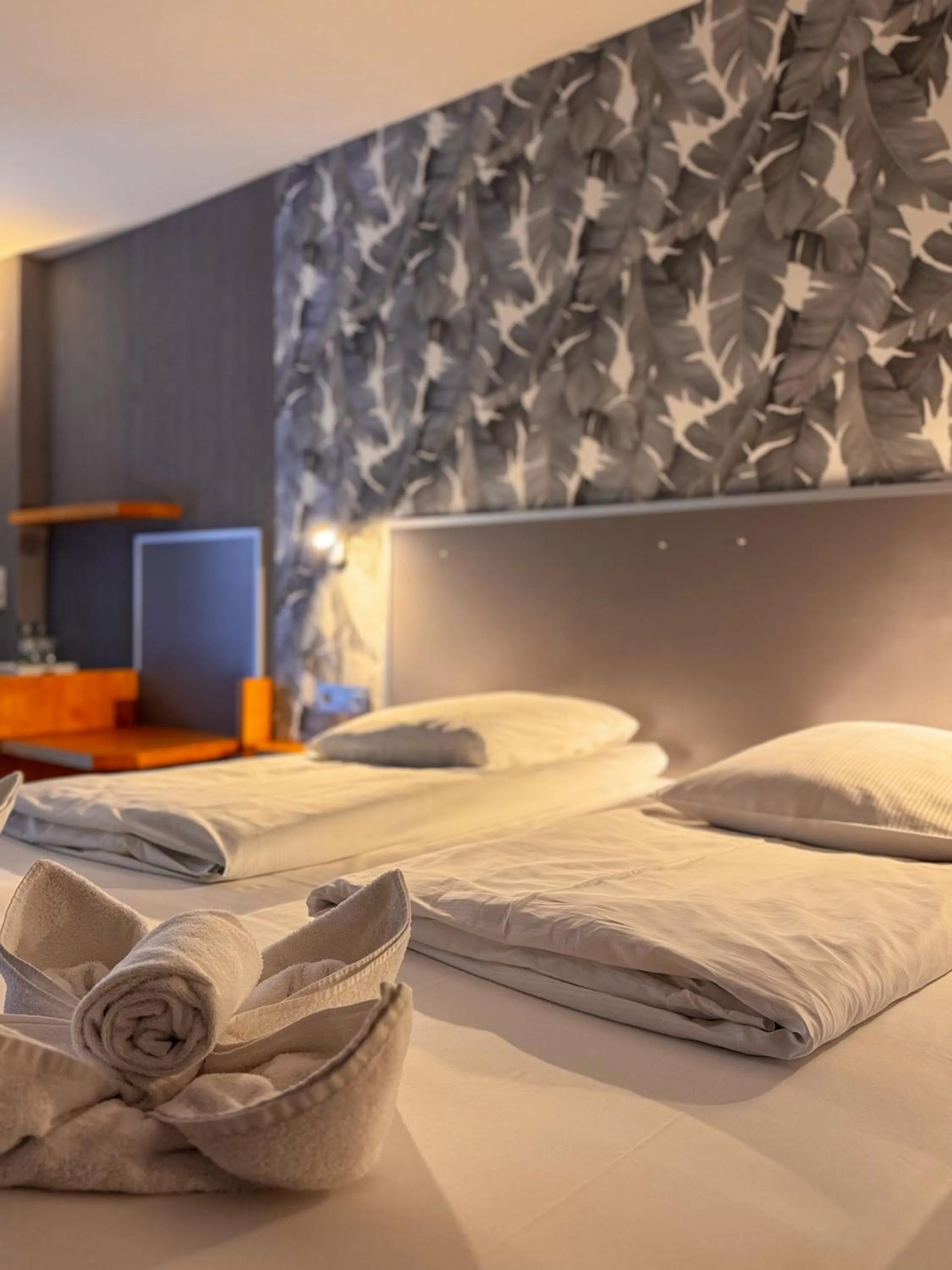 Bed in RAVeL Hotel Cyrano