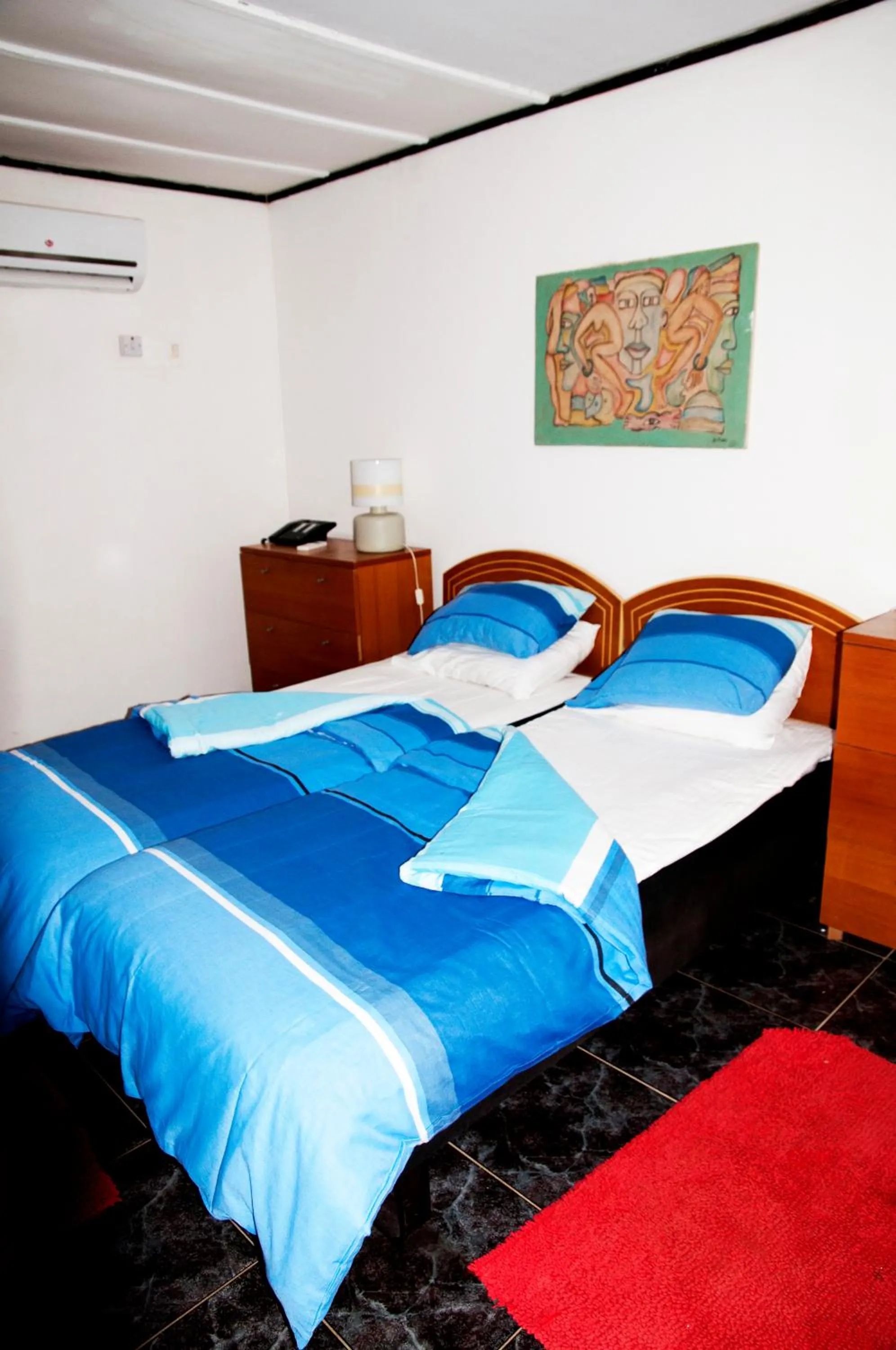 Bed in Bungalow Beach Hotel