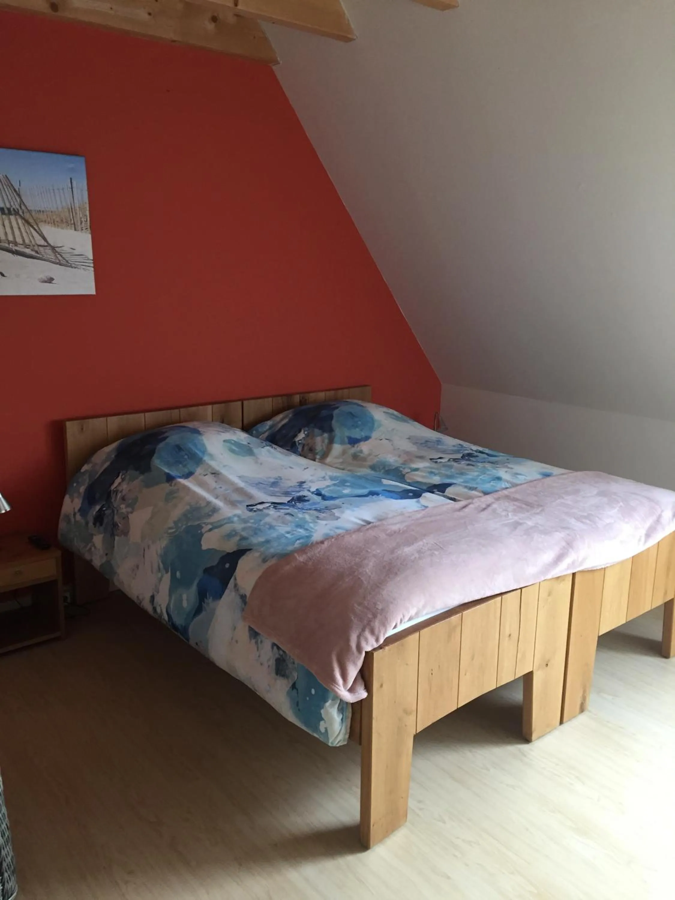 Bed in B&B Idylle aan Zee incl 2 Wellnessstudios