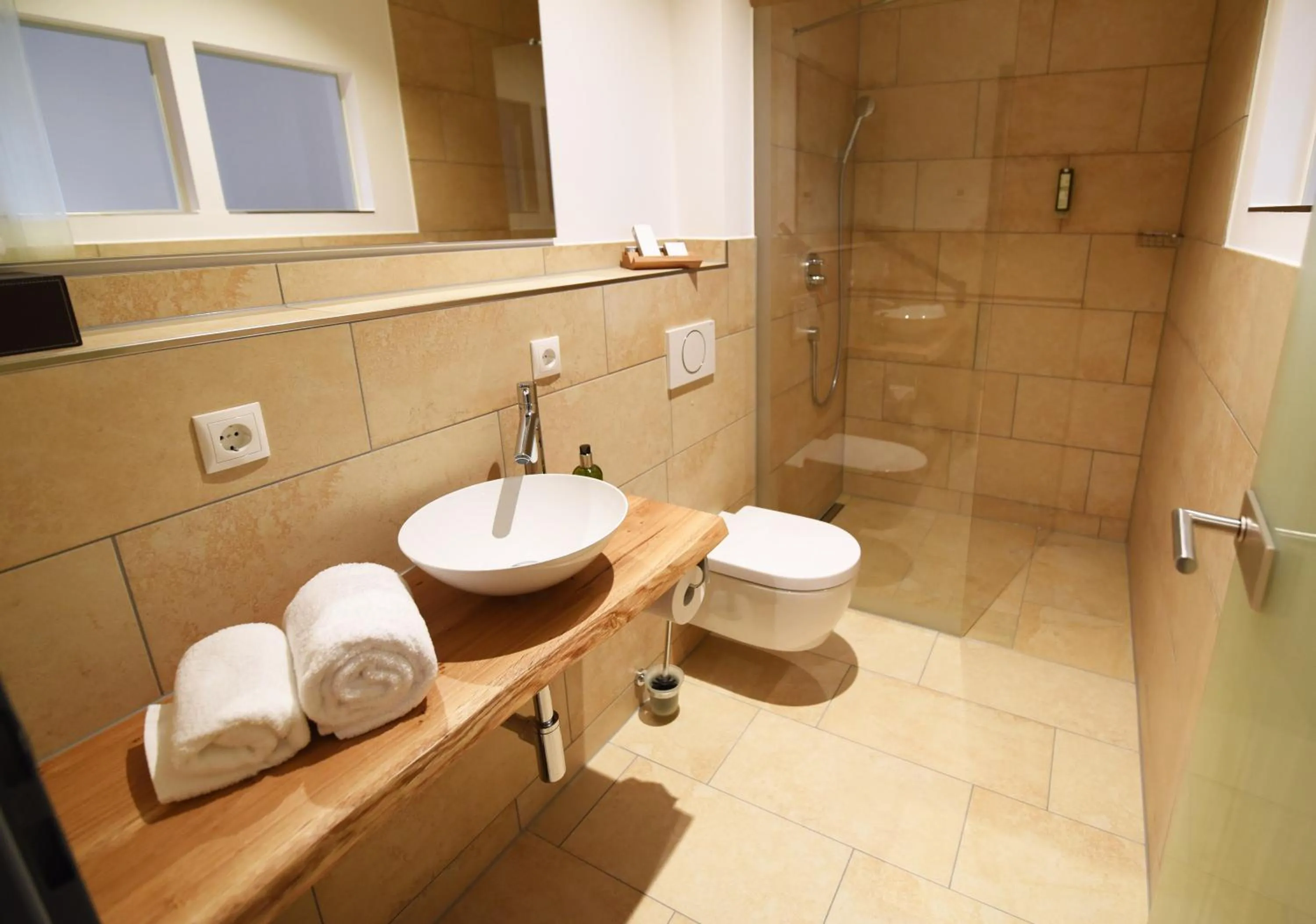 Bathroom in Aparthotel nah dran