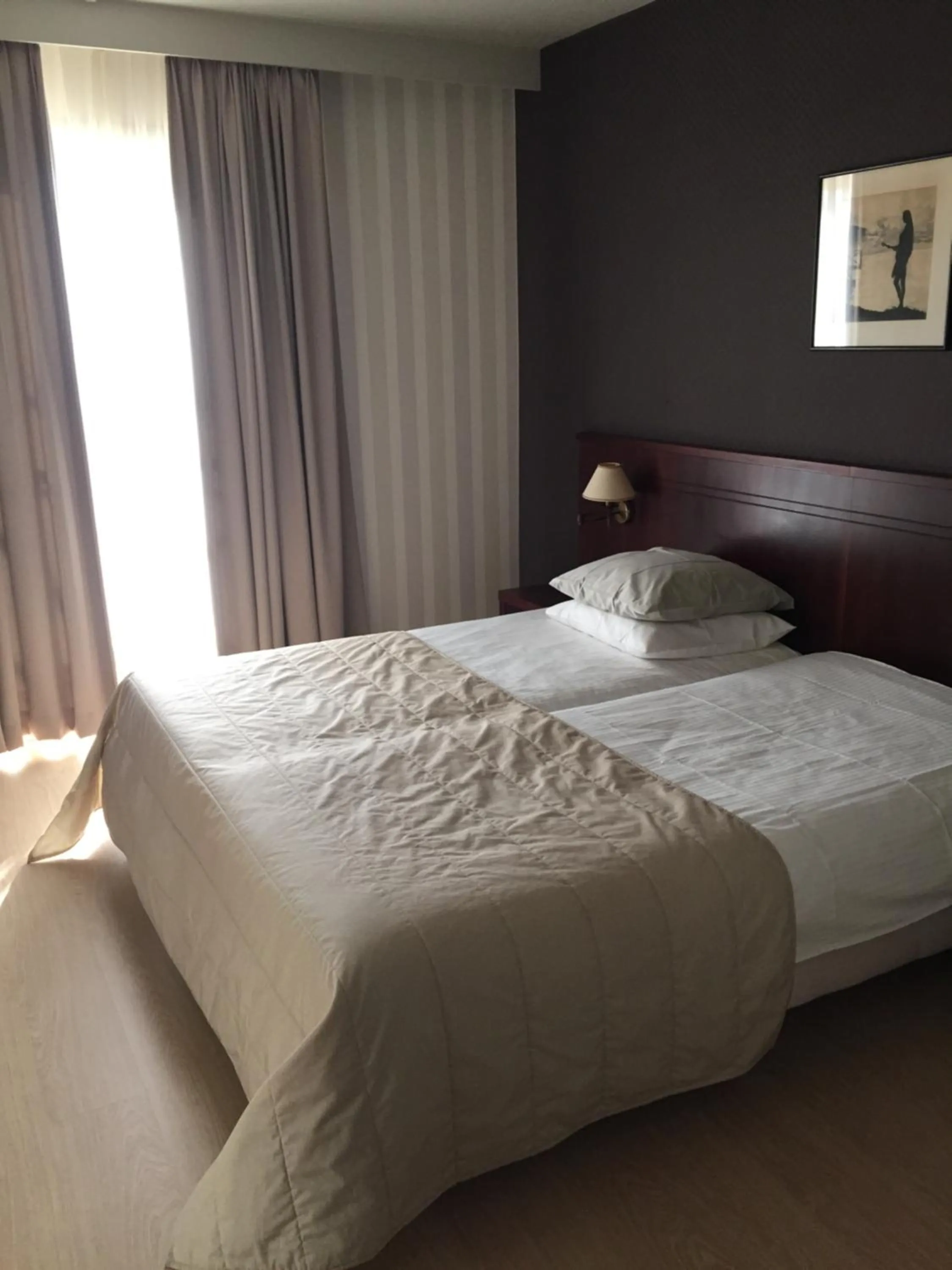 Bed in Hotel Prélude