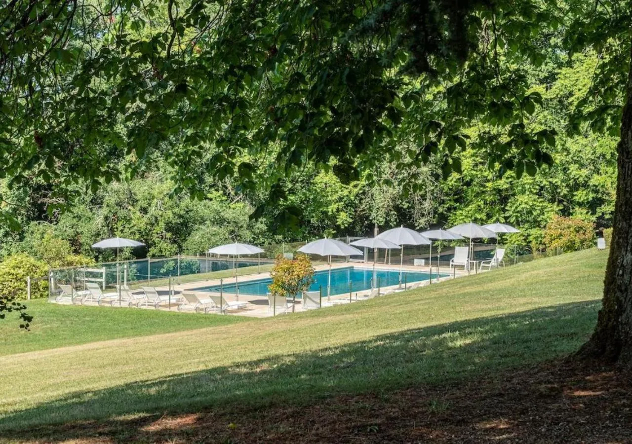 Pool view in Domaine de la Tortinière