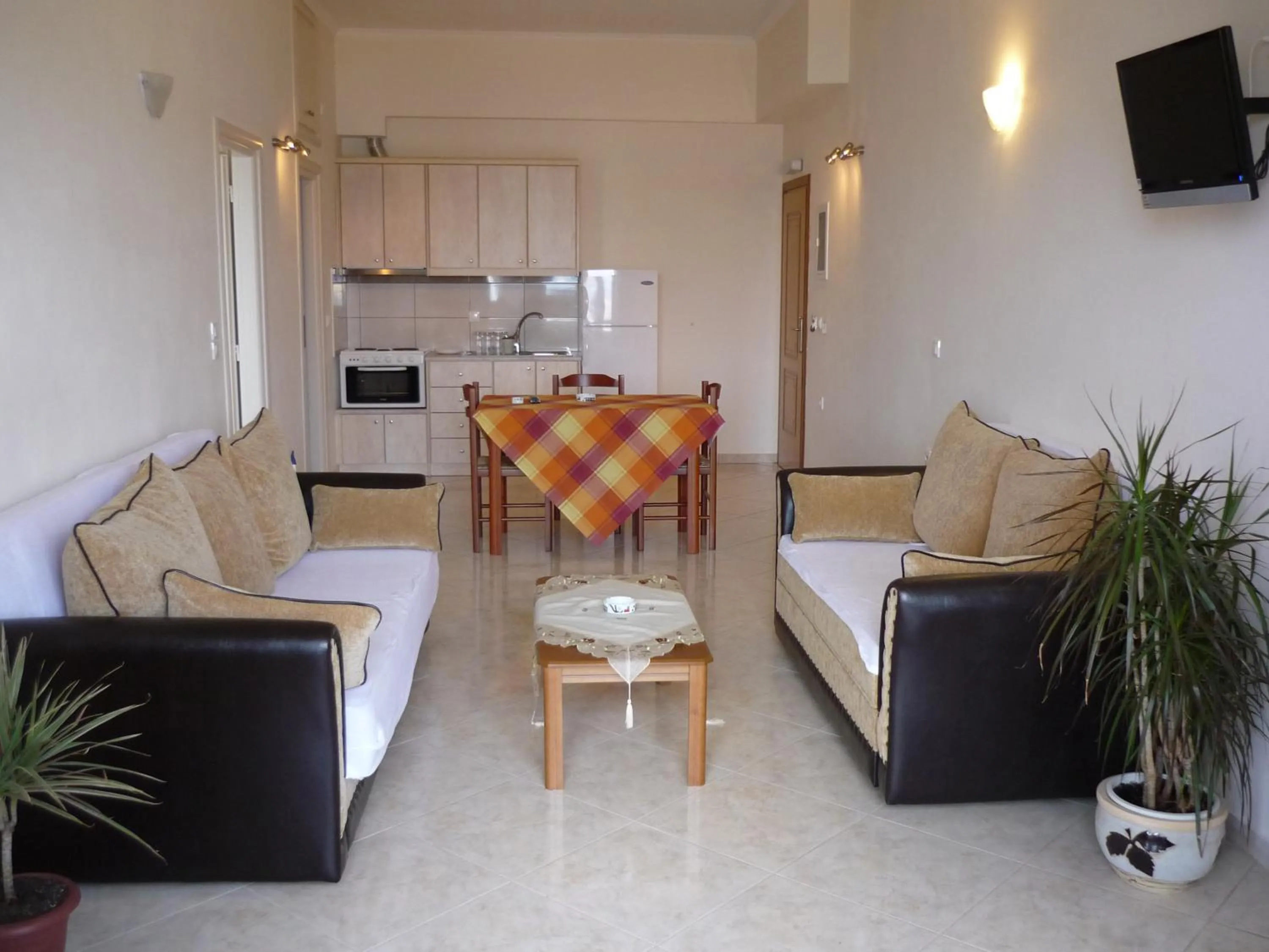 Seating area, Bed in Thea Hotel