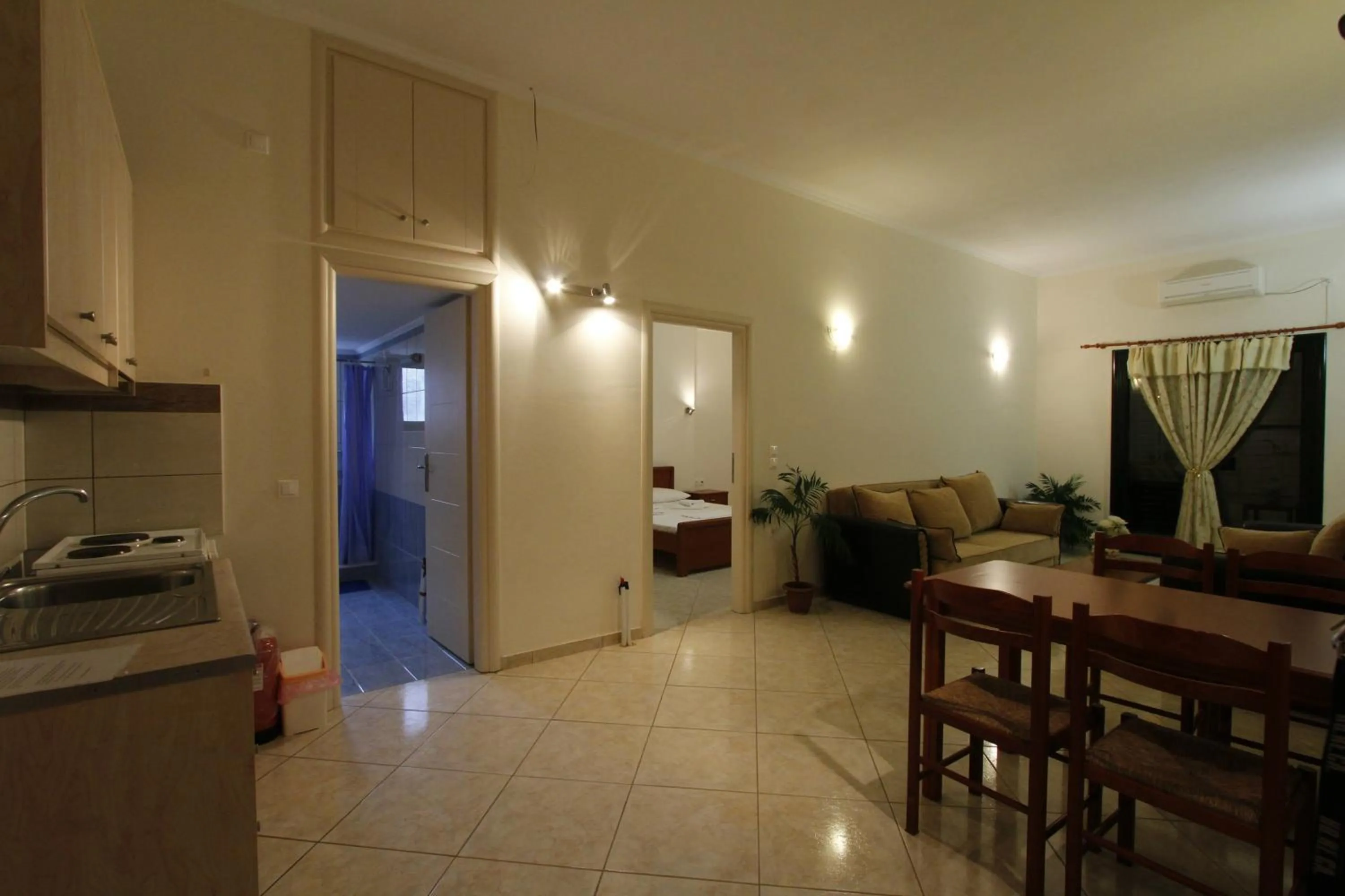 Kitchen or kitchenette in Thea Hotel