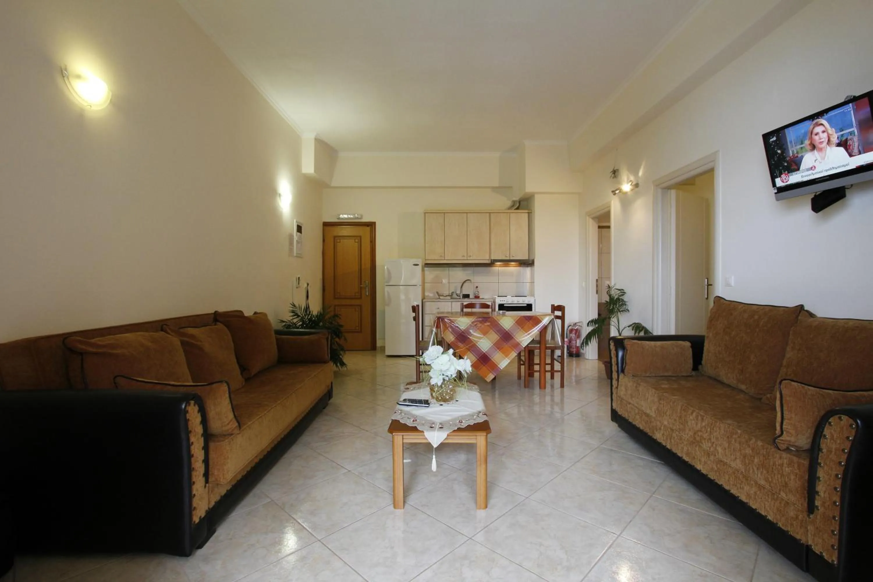 Kitchen or kitchenette in Thea Hotel