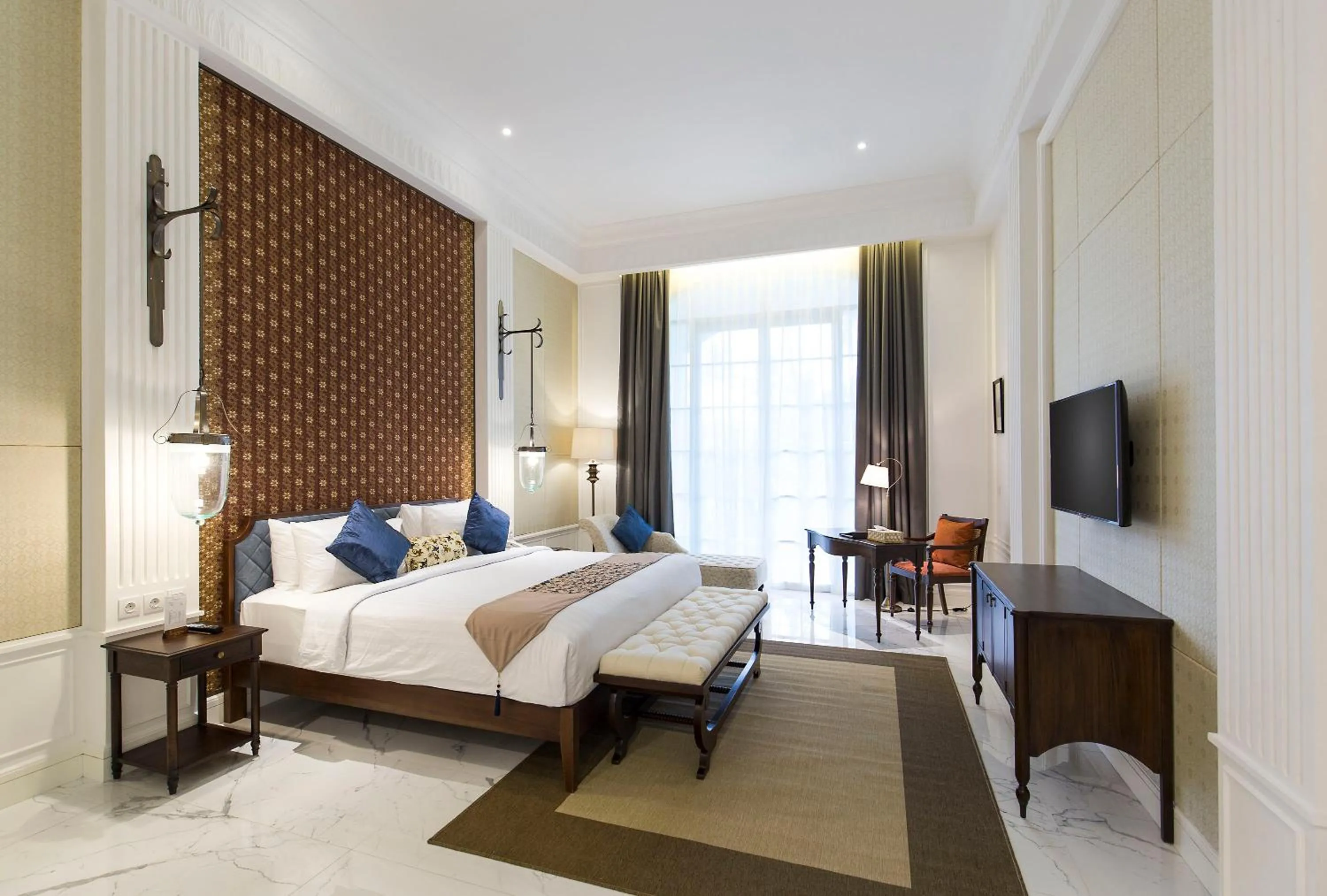 Bed in Plataran Heritage Borobudur Hotel